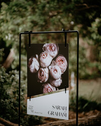 fallback shared on Invalid Date | Two-piece wedding welcome sign with roses and bold fonts