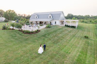 fallback shared on Invalid Date | Drone image of wedding couple in Blue Bell Farms