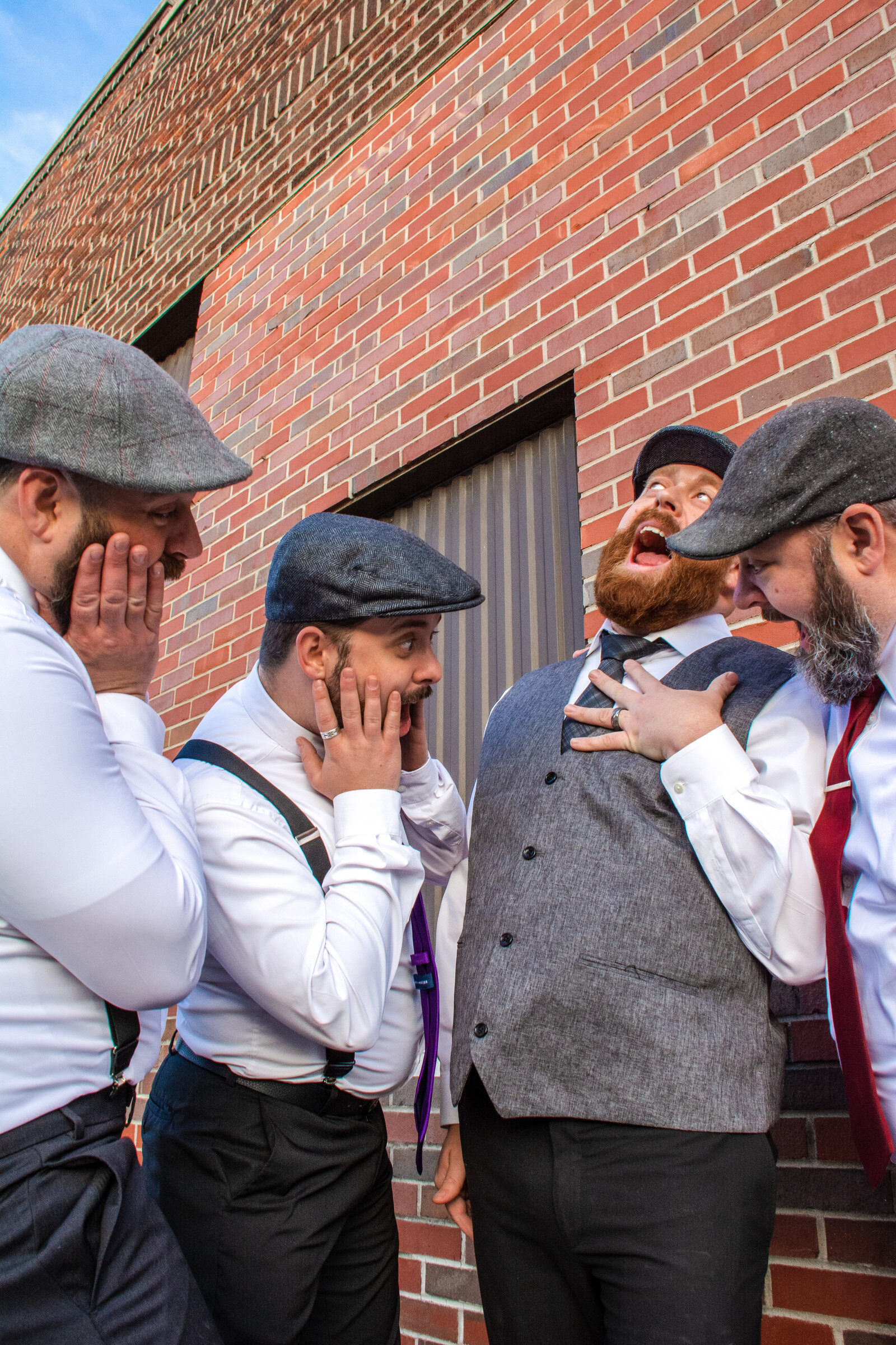 grooms men fuss over grooms ring in yuma wedding