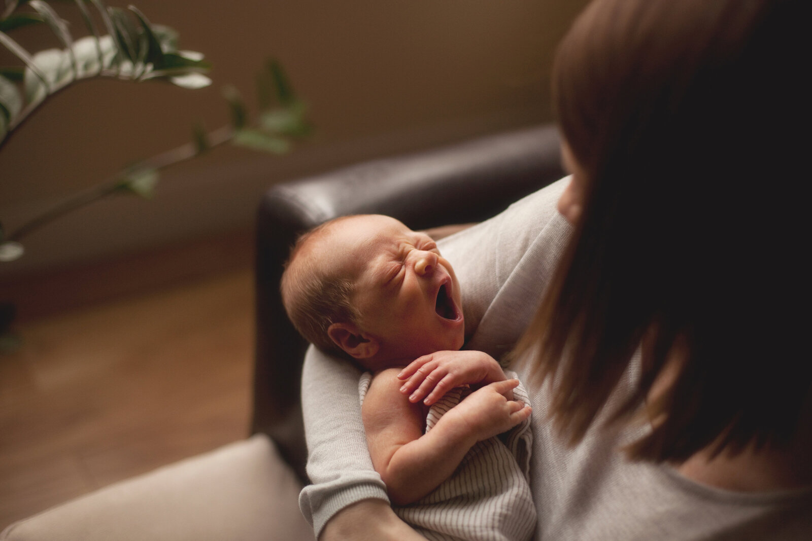 baby with mom photo yawning