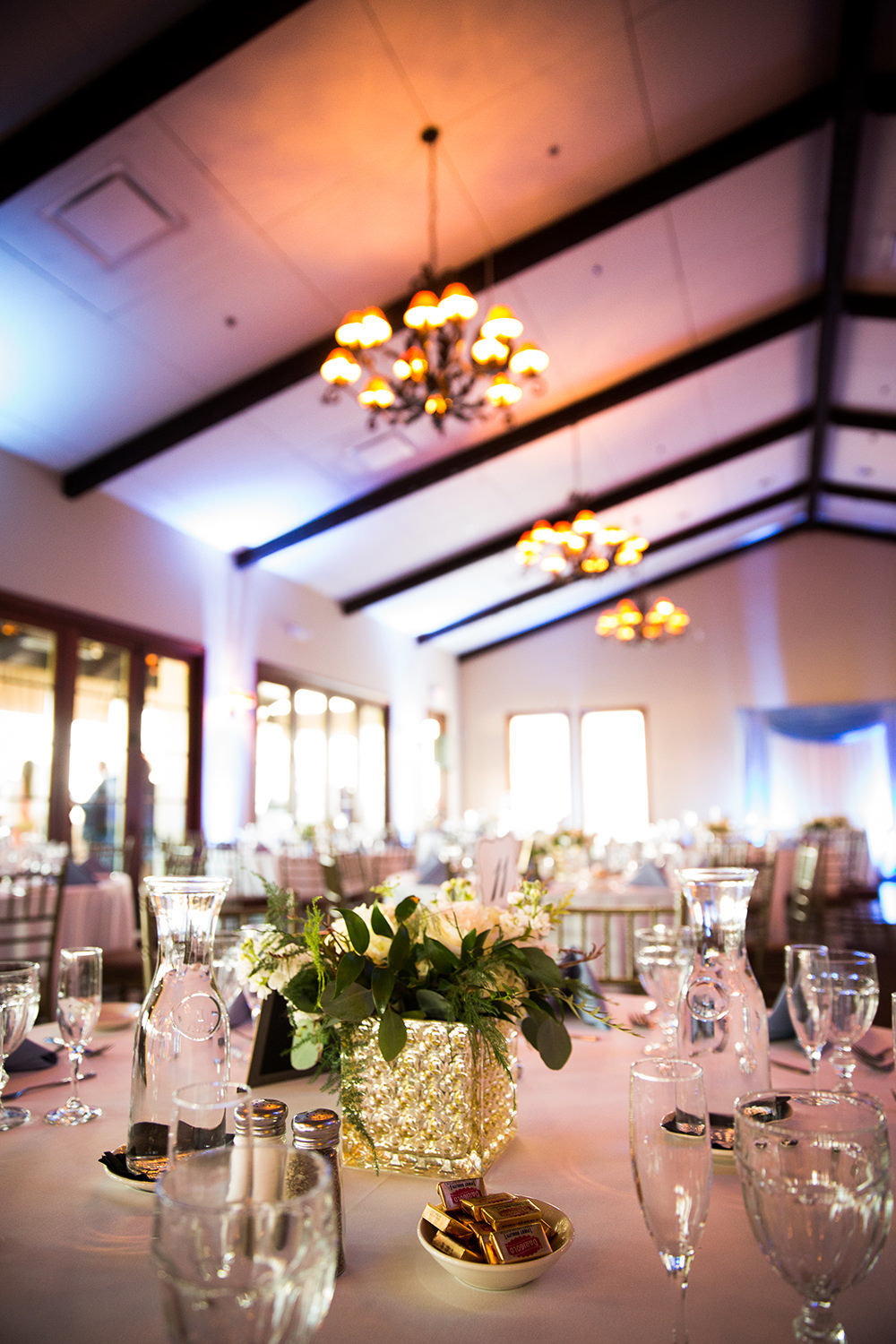 reception space at wedgewood purple uplighting