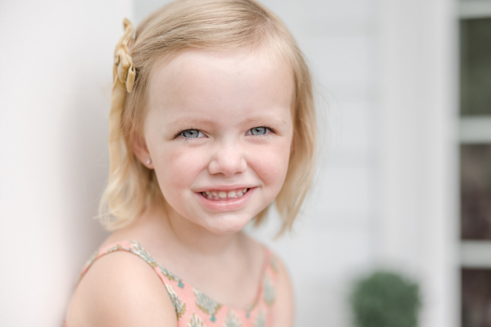Young girl smiling for portrait.