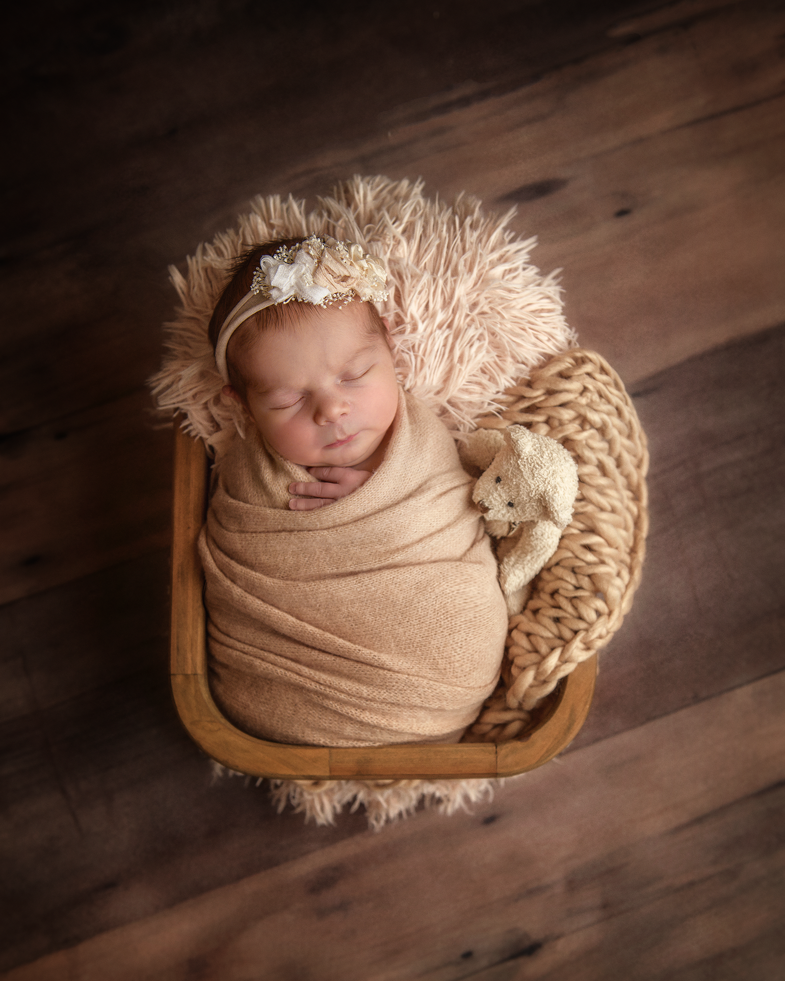 Newborn-Baby-girl-in-a-basket