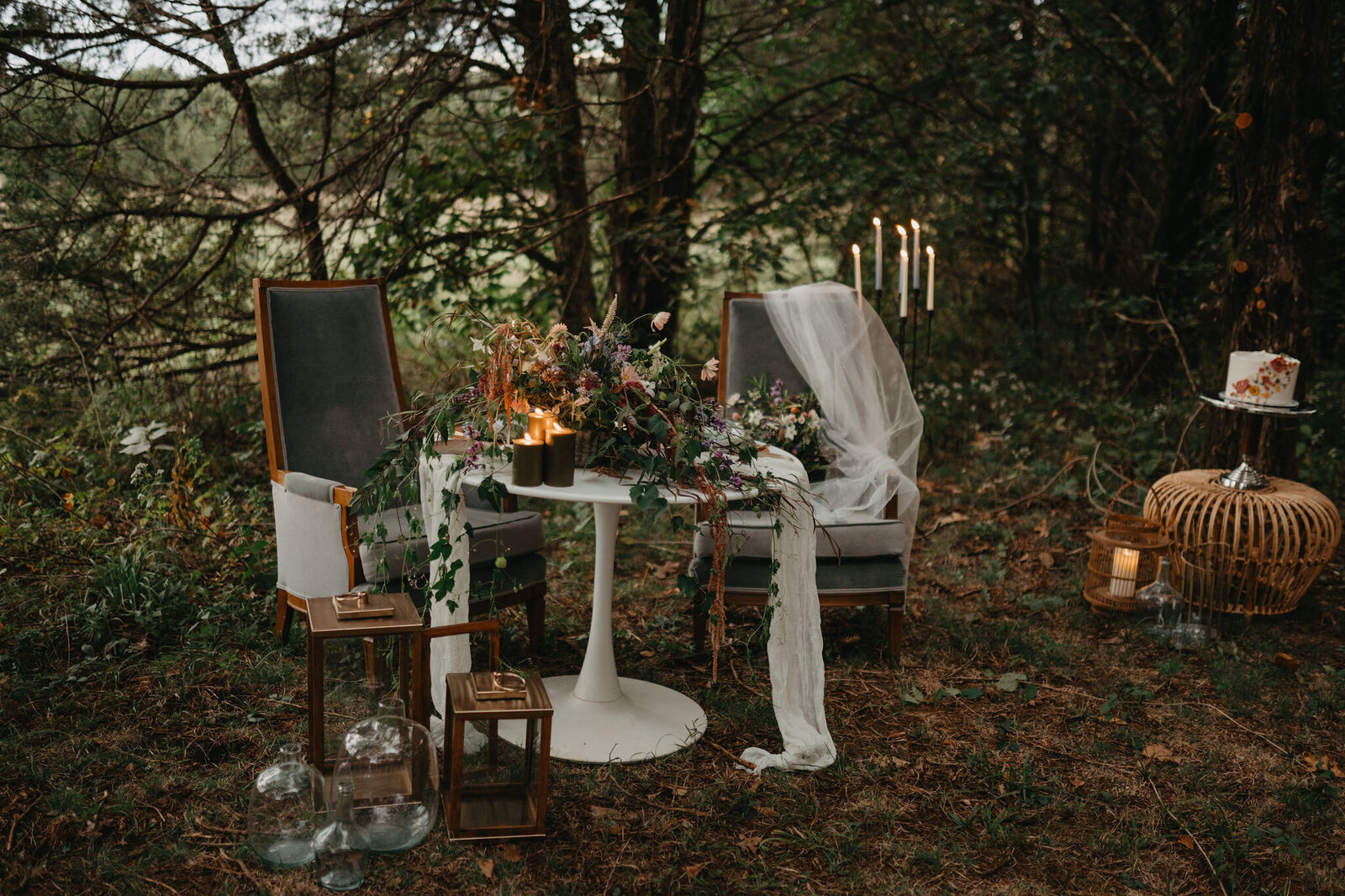 Sweetheart table for an outdoor wedding in the woods