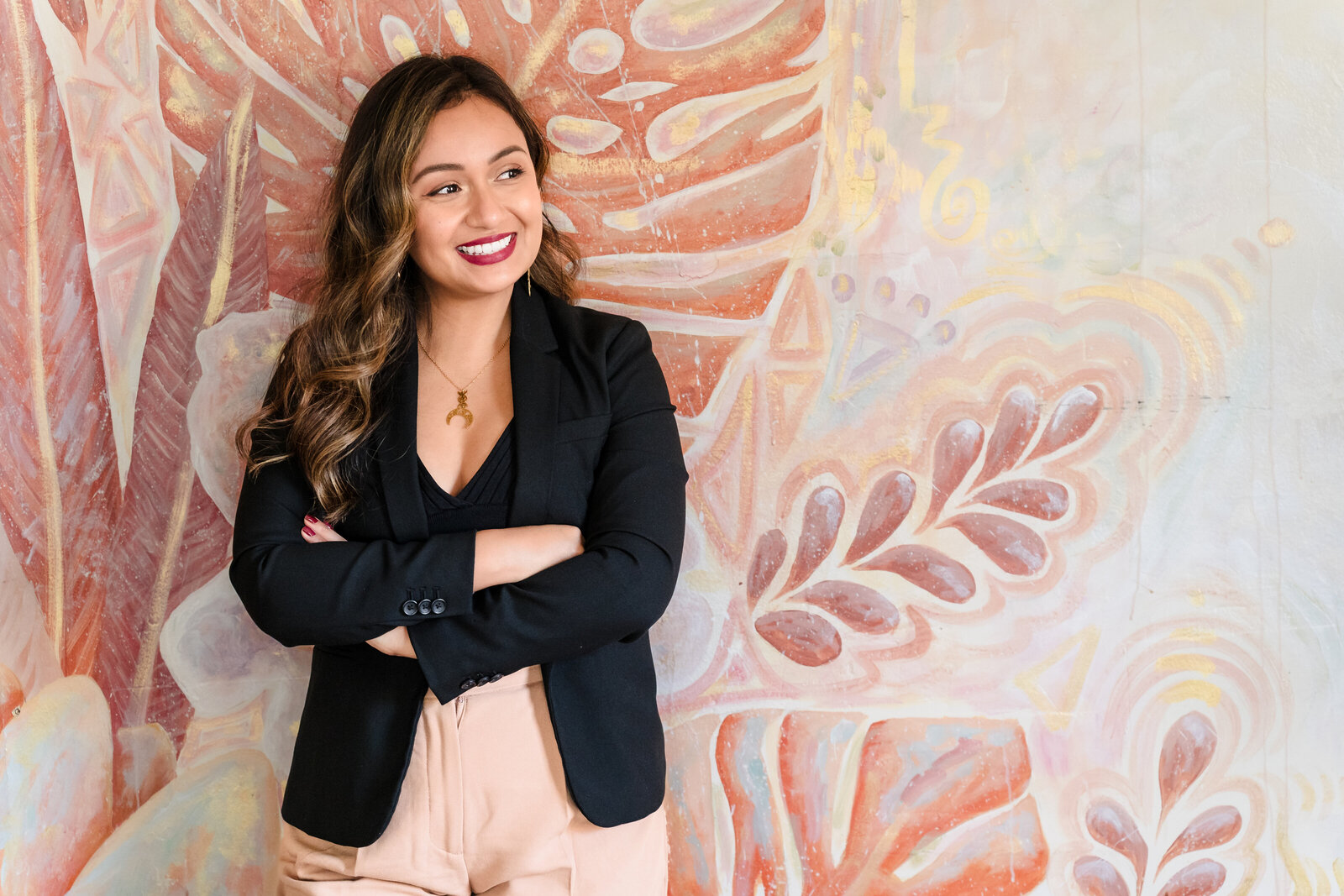 Coach for women  with  arms crossed in a boss pose