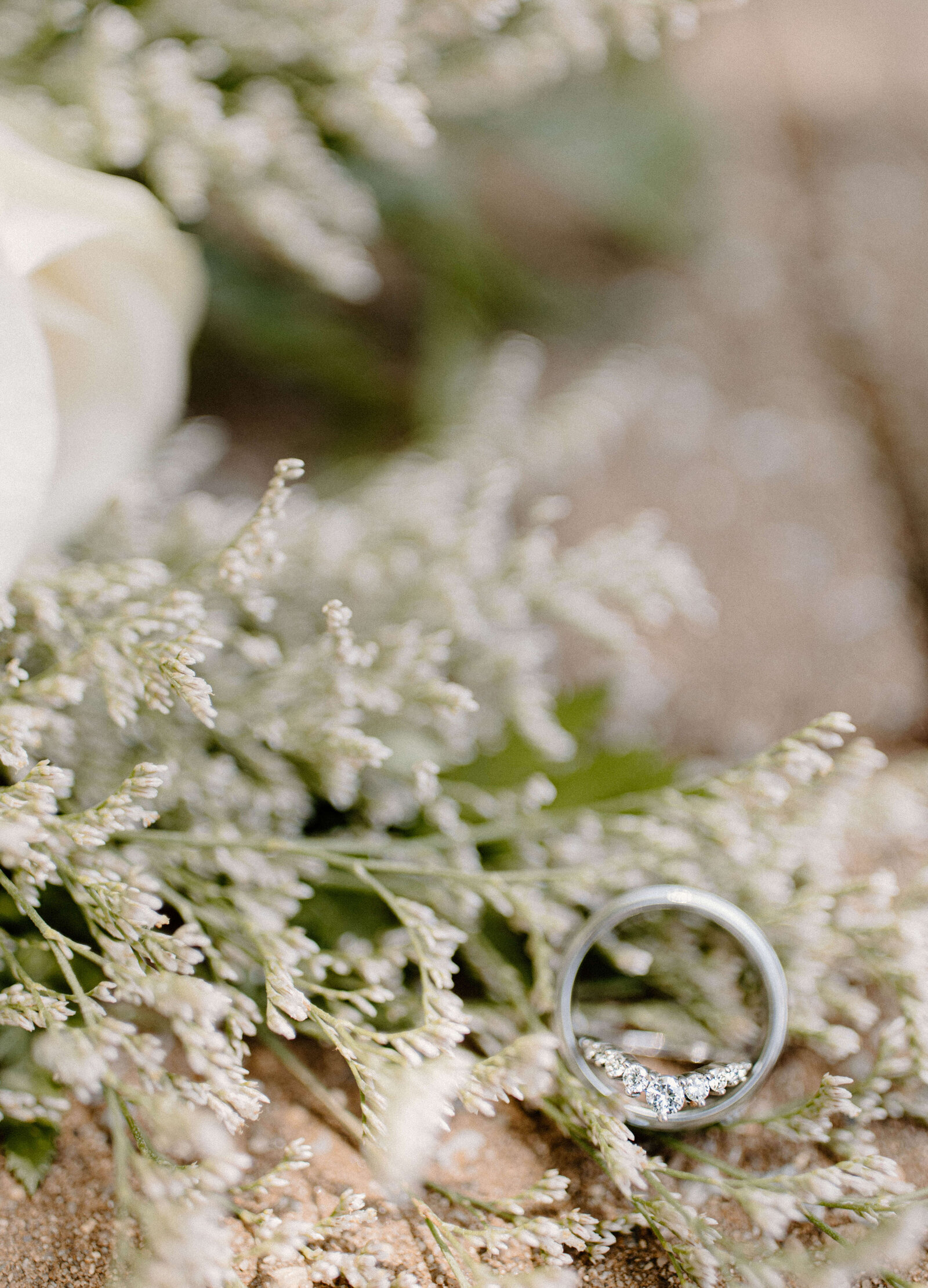 close up ring photo shot on babys breath flower bouquet baltimore wedding photography