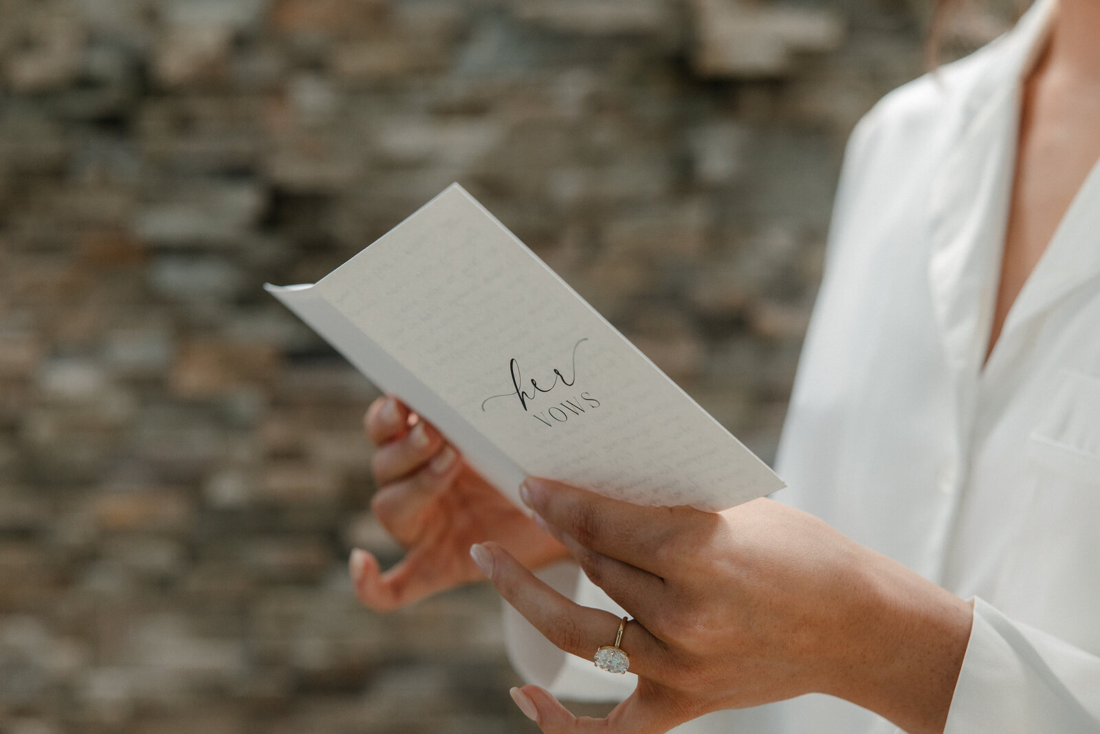 bride holding her vows