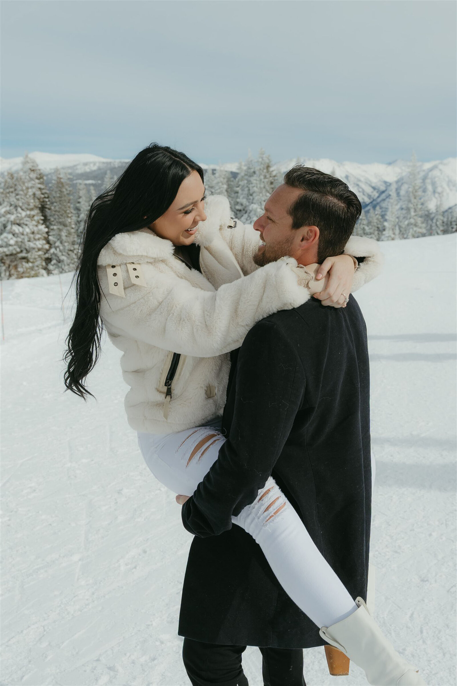 Aspen winter engagement photography on Ajax Mountain