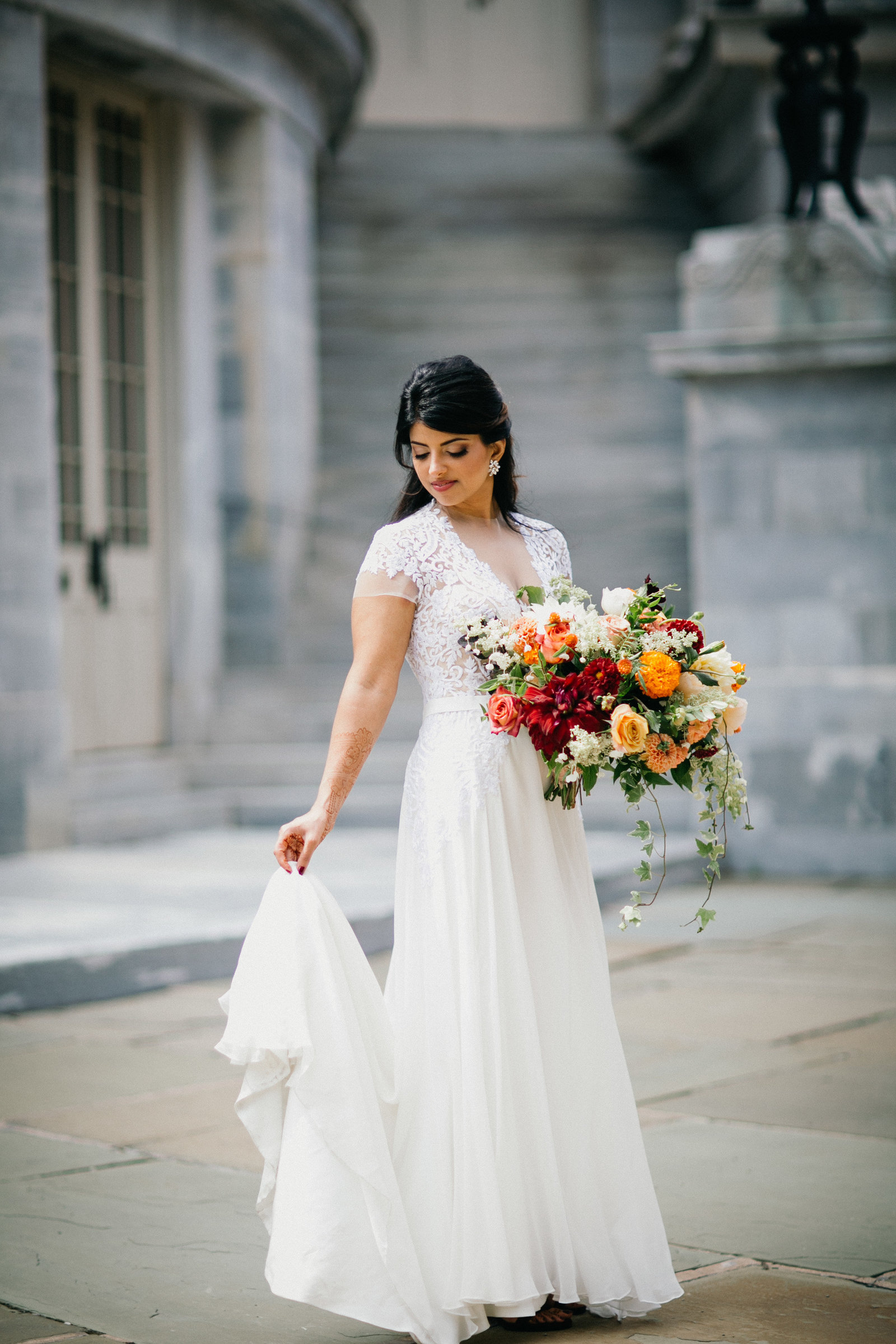 This bride's colorful bouquet stood out and popped next to her white gown.
