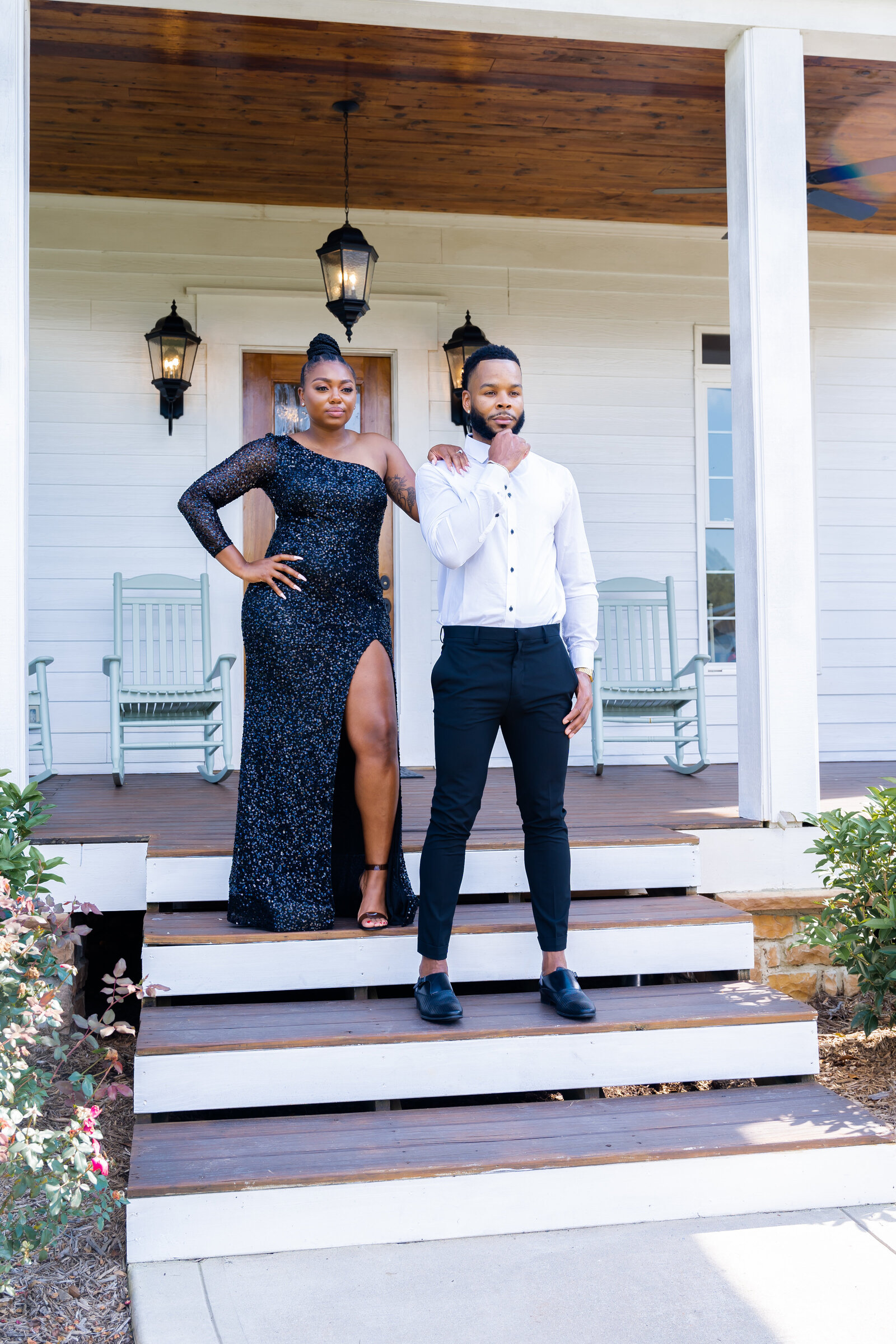 Engagement photoshoot, man wearing black and white suit, woman wearing black sequin dress