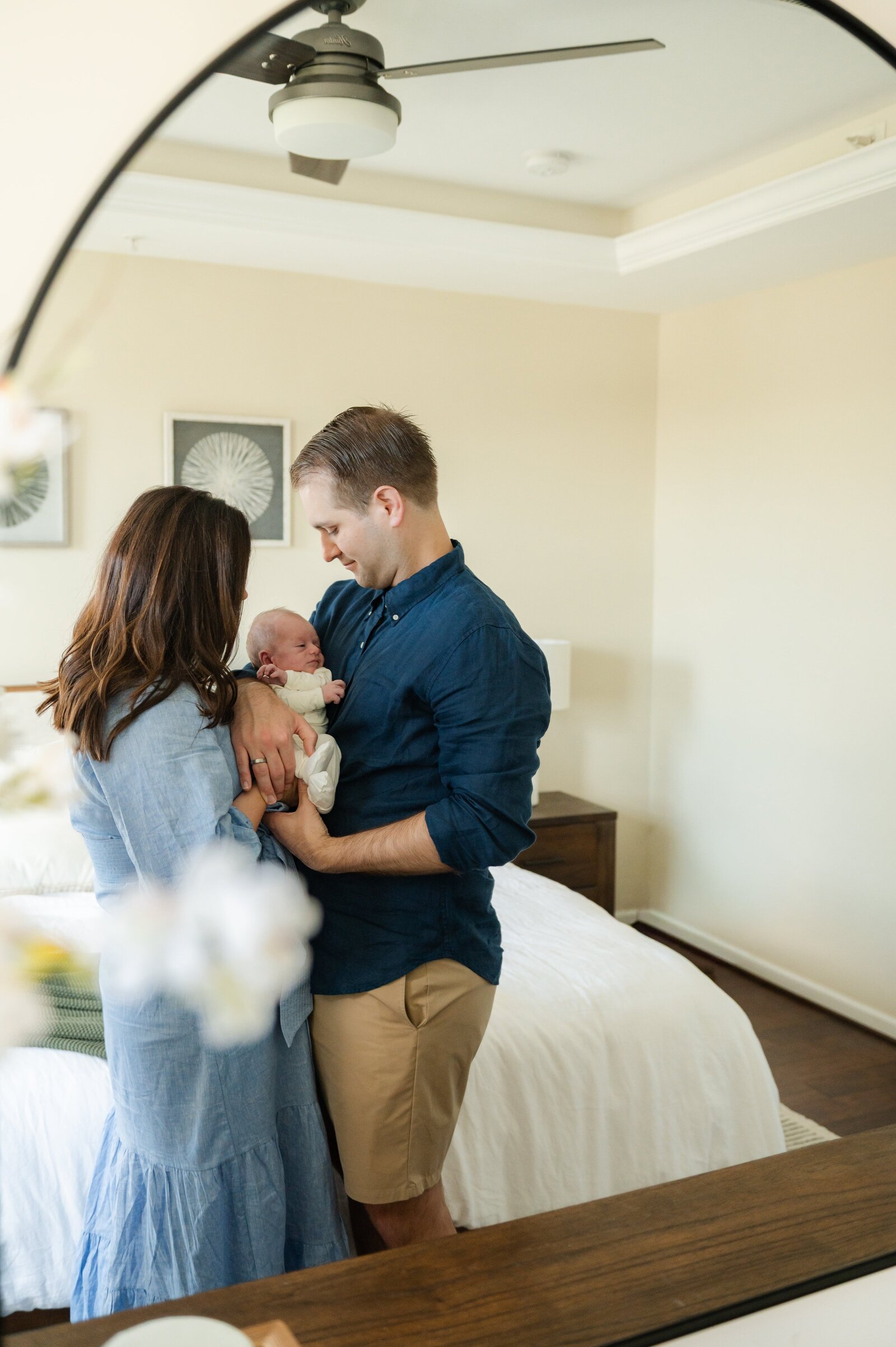 Baltimore newborn photographer capturing cozy studio portraits with natural light