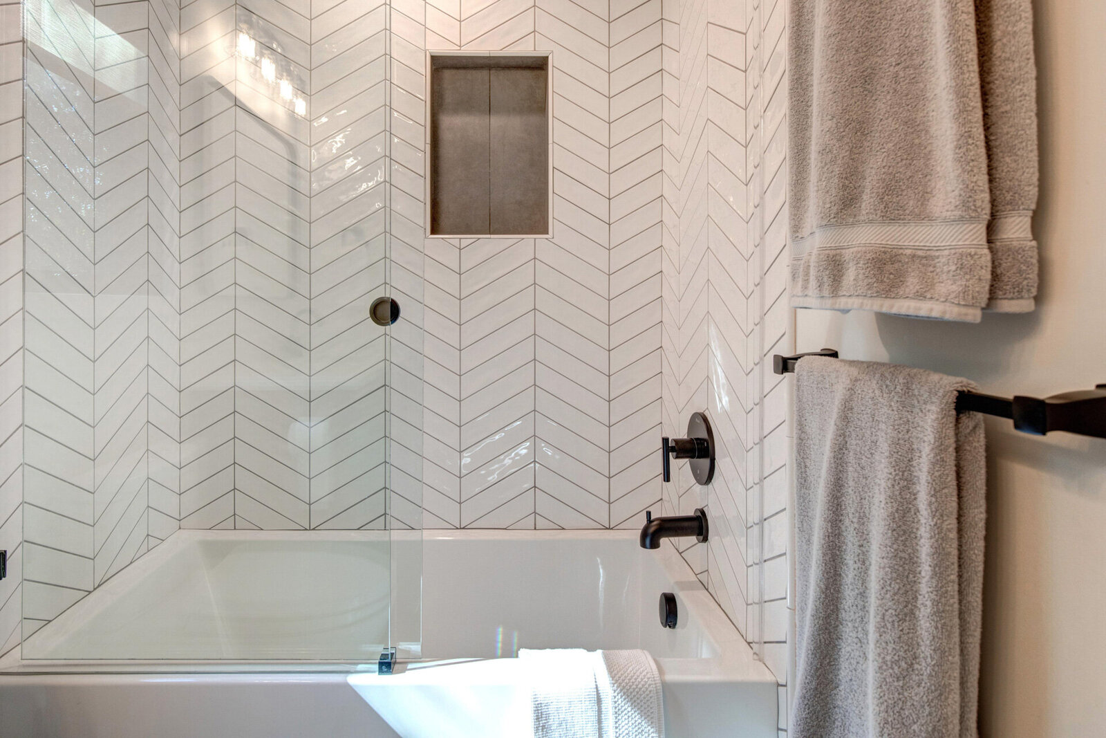 Heber-City-Interior-Designer-Chalet-and-Co-bathroom-chevron-tiled-backsplash