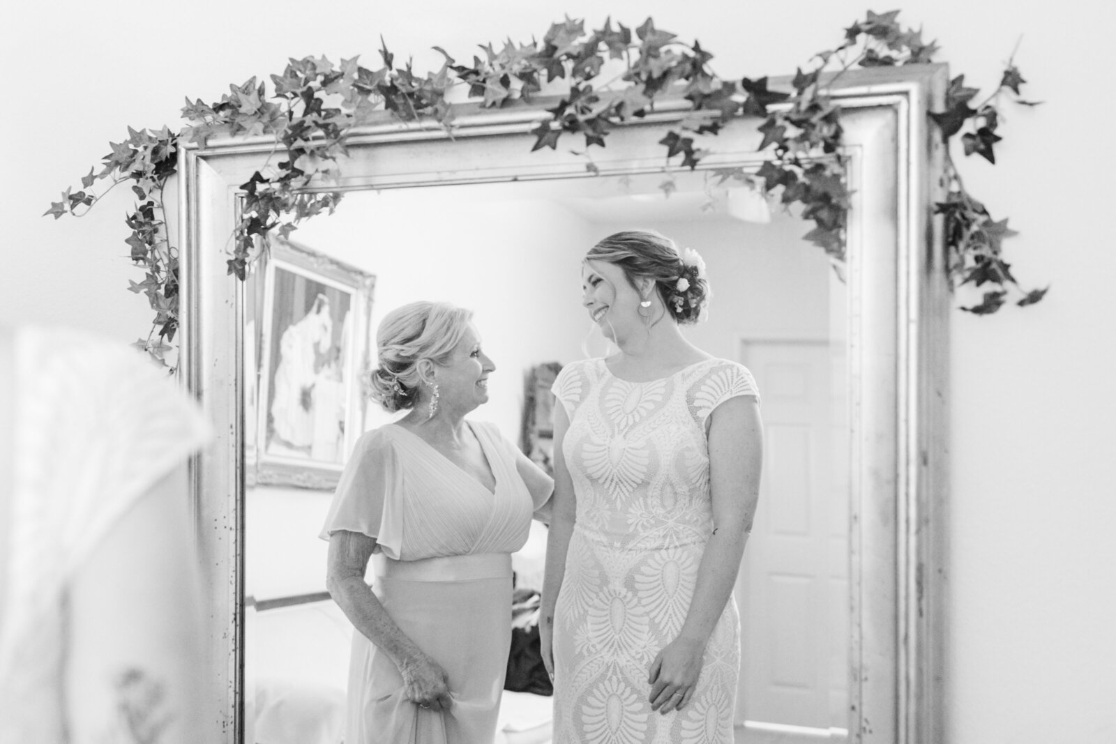 Bride getting ready on her colorful wedding day in Santa Cruz, California in the redwood trees.