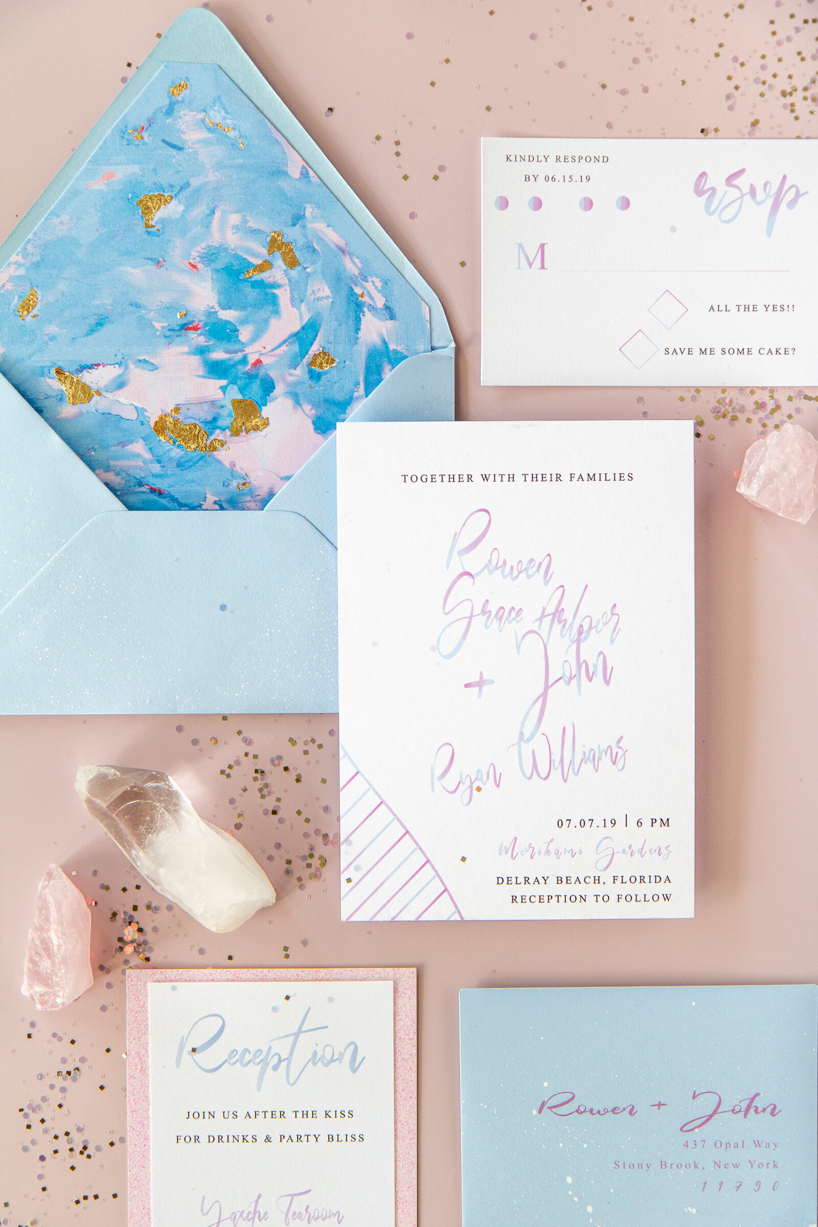 A pastel wedding invitation set featuring the invitation card, rsvp card and wedding details card.