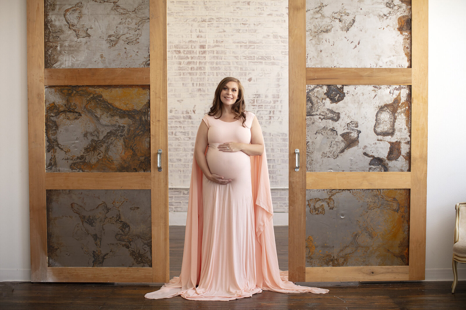Pregnant woman at downtown Dallas photography studio.