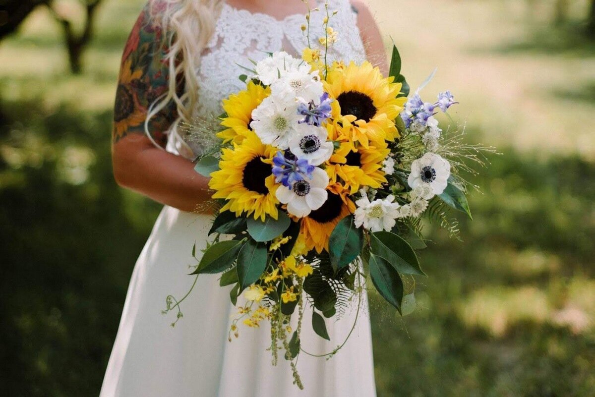 Sunflower bridal bouquet by Flowers and Thyme.