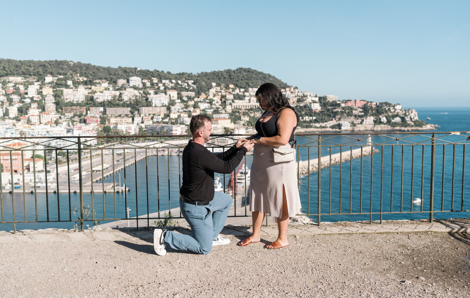 touching sunny surprise proposal with view of sea in nice france-04472