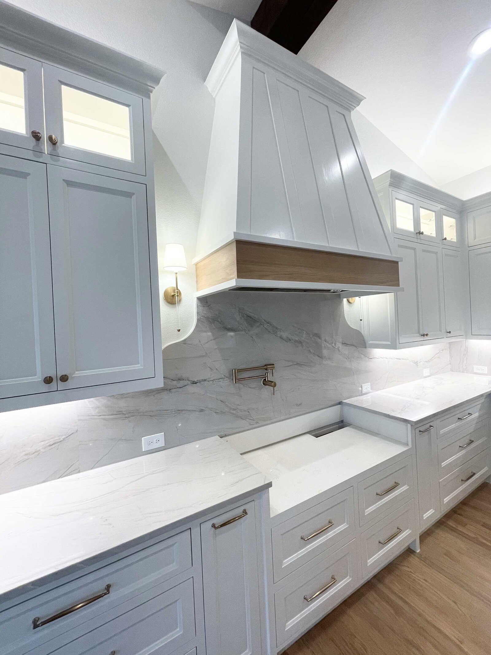 Home remodeling design for a kitchen project featuring modern cabinetry, sleek countertops, and efficient layout, creating a functional and stylish cooking space.