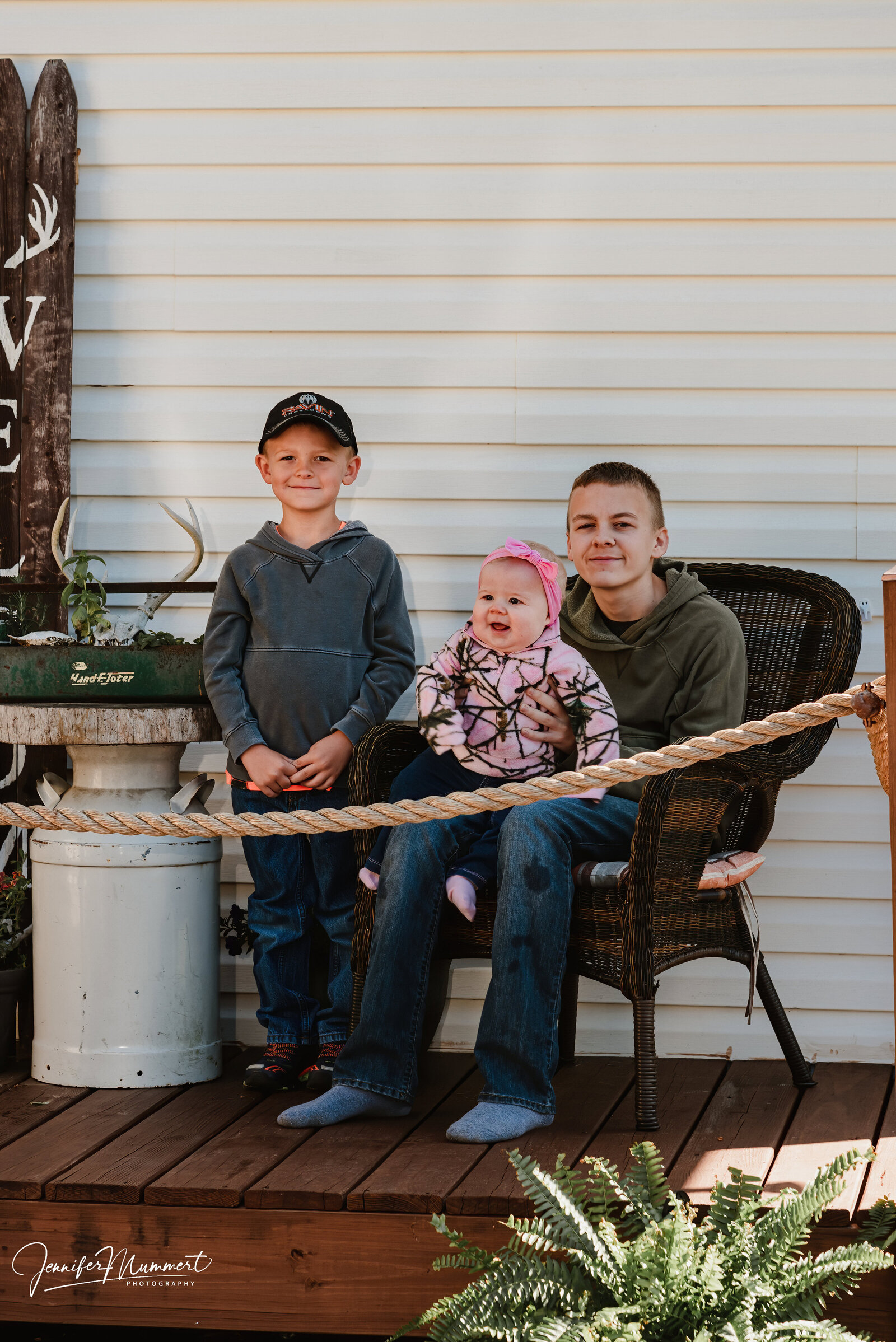 Kids on porch hanging out.