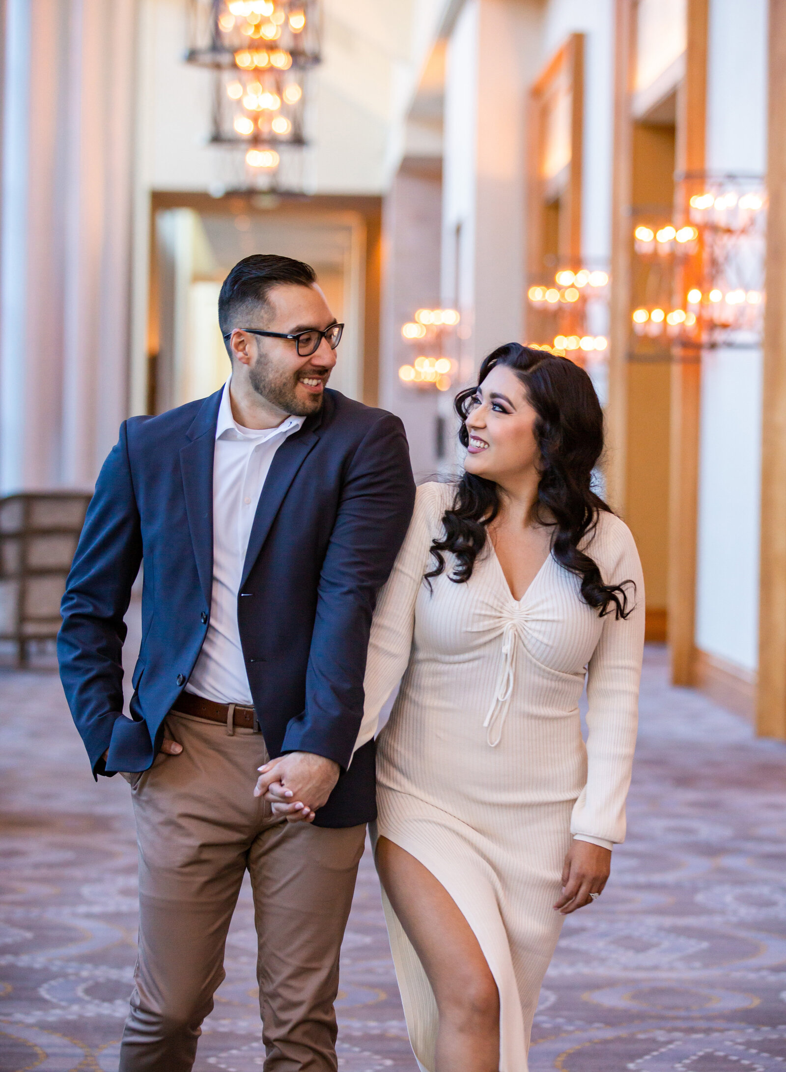 modern couple laughing in hotel