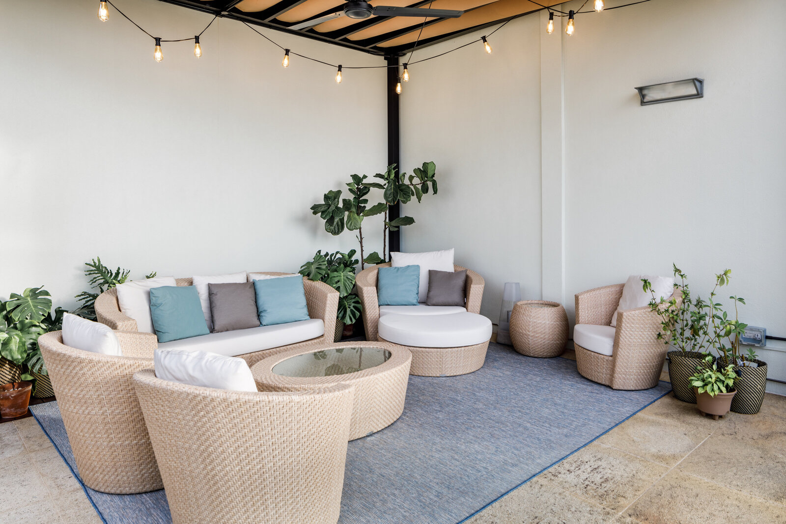 outdoor lounge  furniture and orange lights