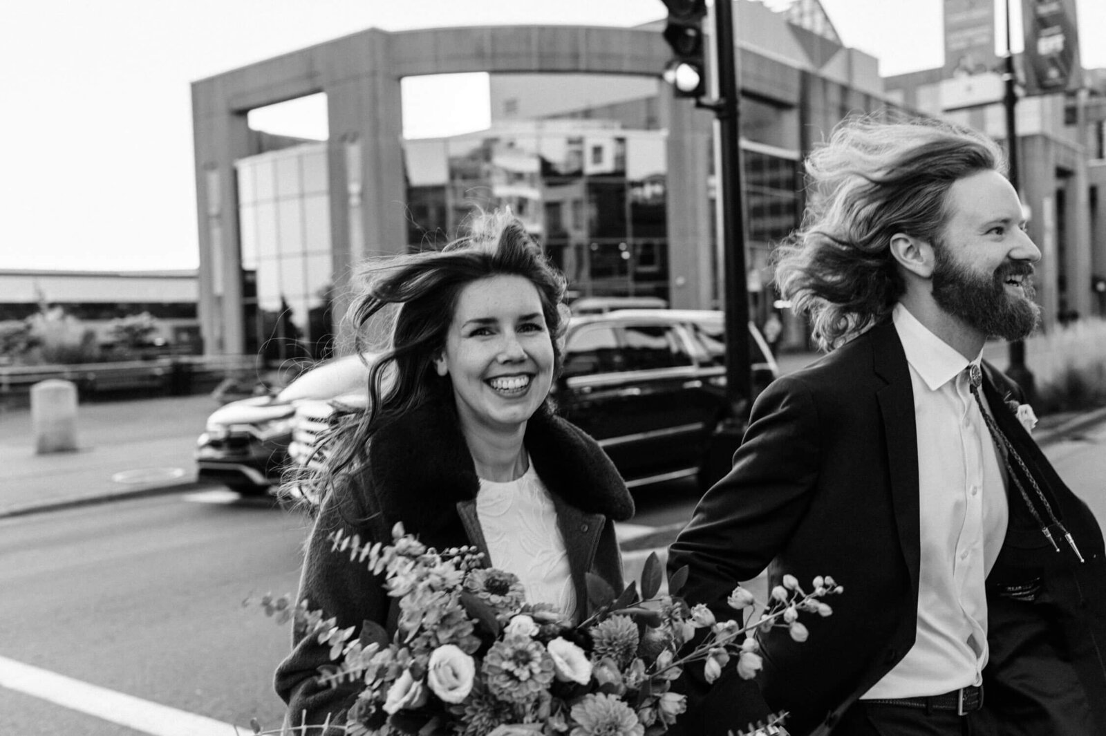 Candid moment of wedding couple downtown Halifax.