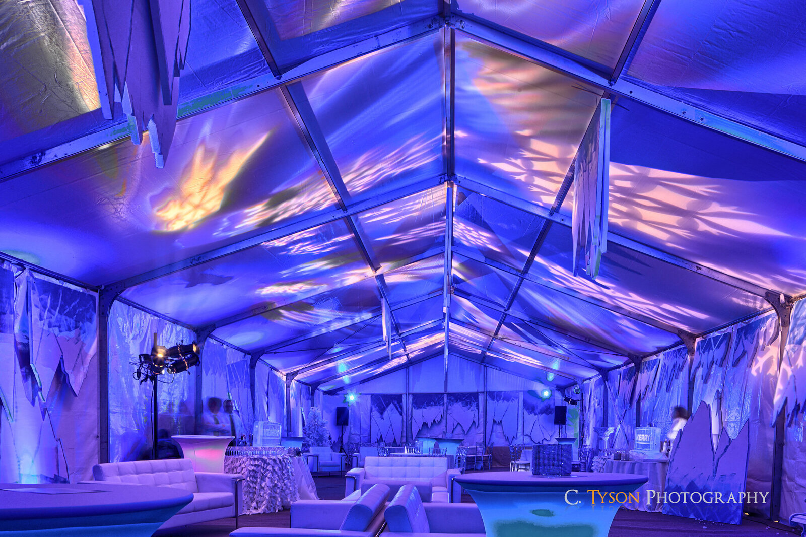 Vibrant purple-lit photobooth setup for Chicago weddings and events by Charizma