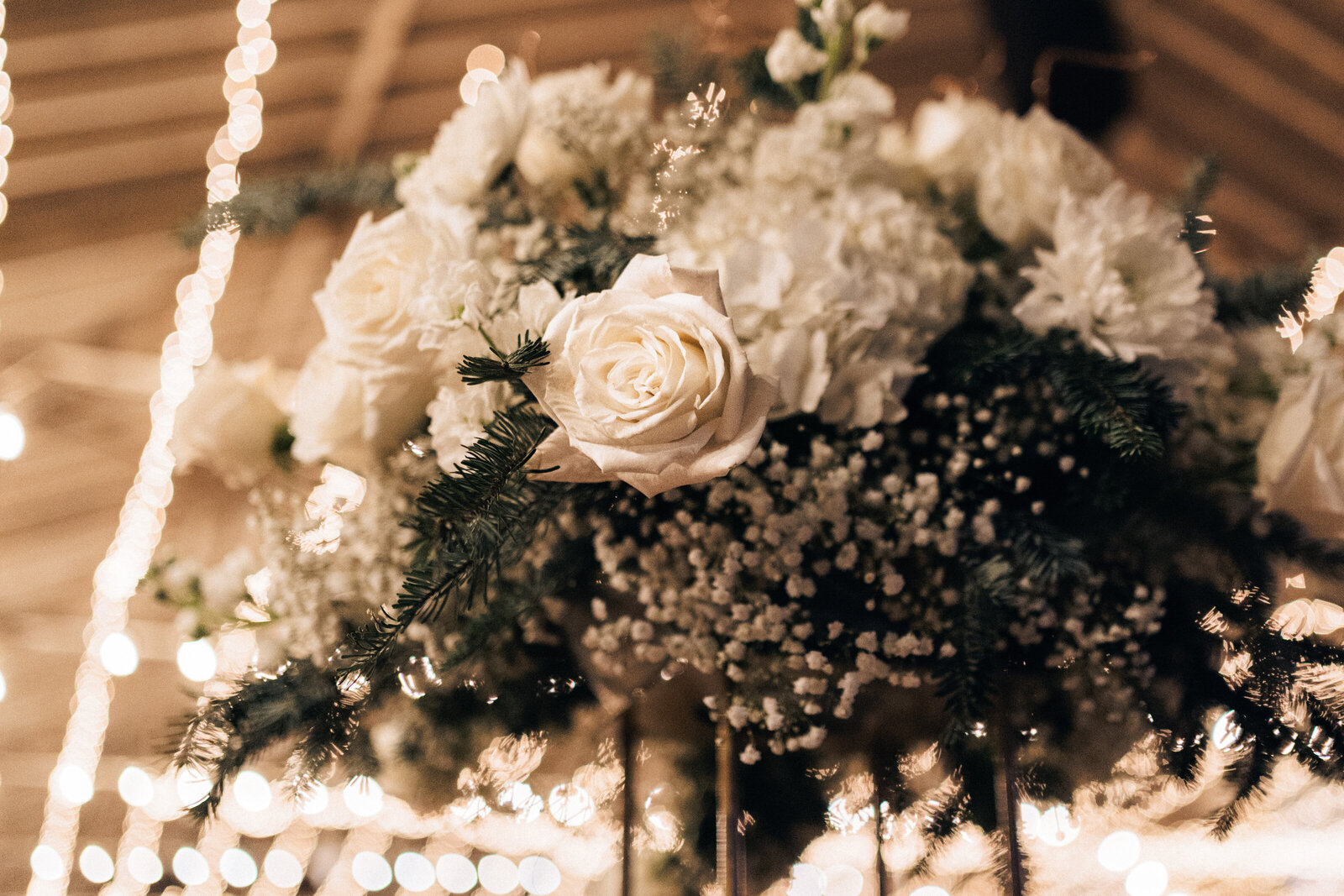 Towering White Floral centerpiece for NYE Wedding