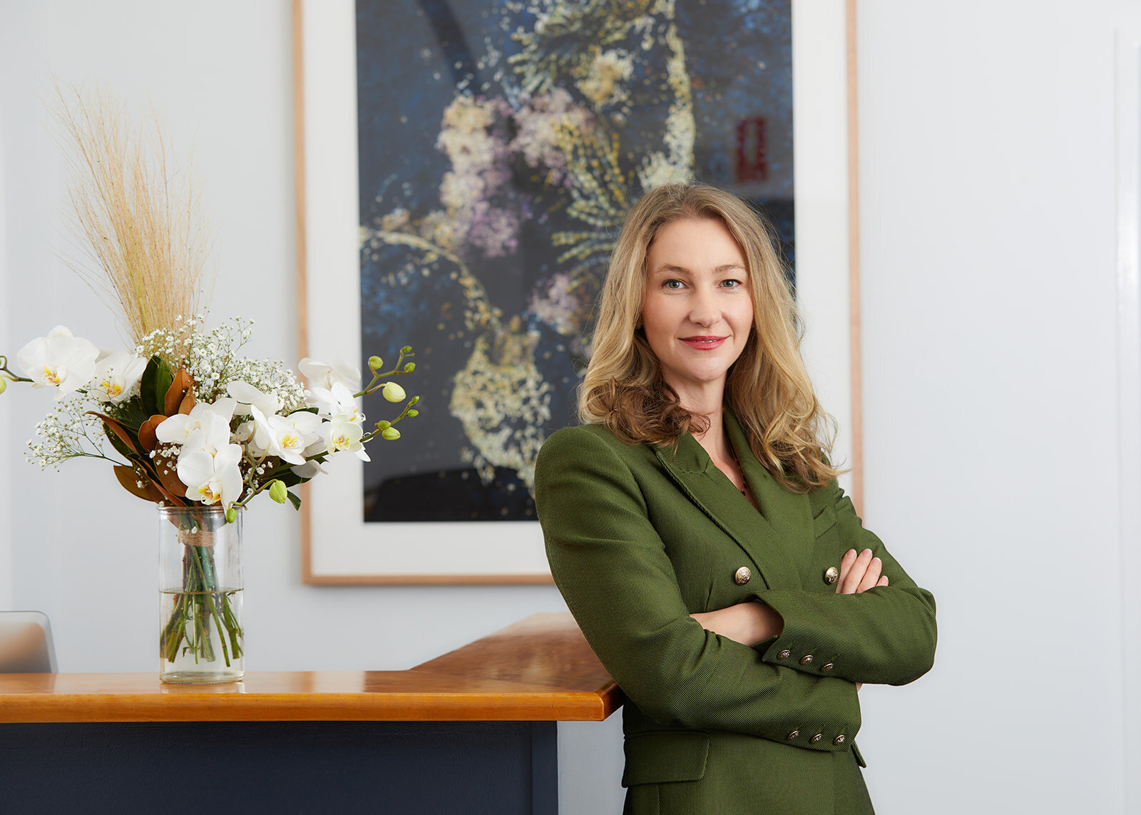 business profile photo of plastic surgeon Dr Marcia Mickelburgh in her reception