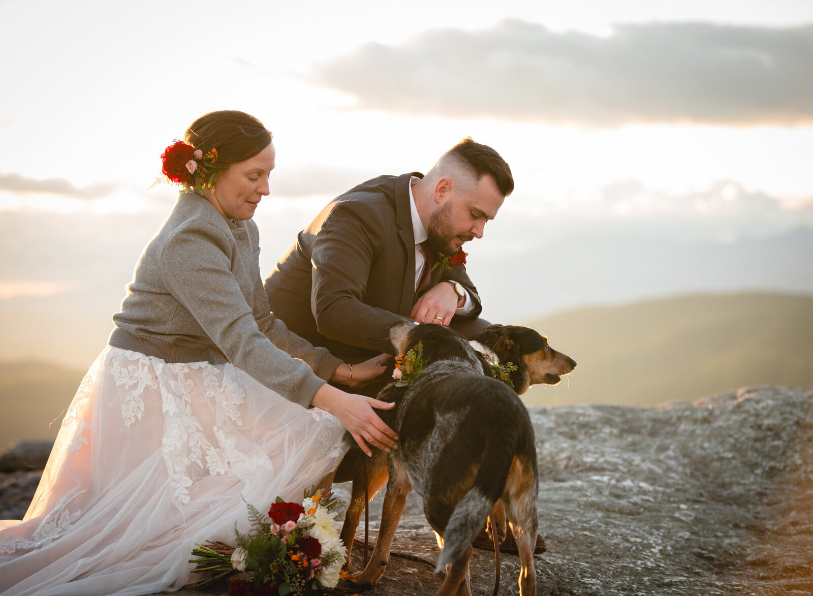 couples portrait with their dogs by New Hampshire elopement photographer