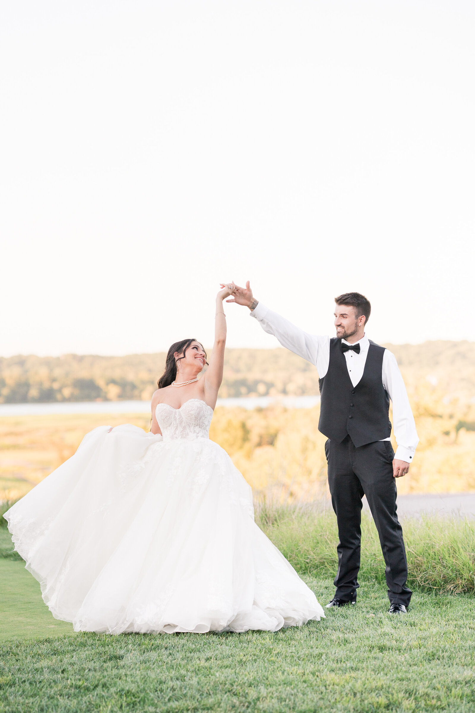 country club weding couple twirling