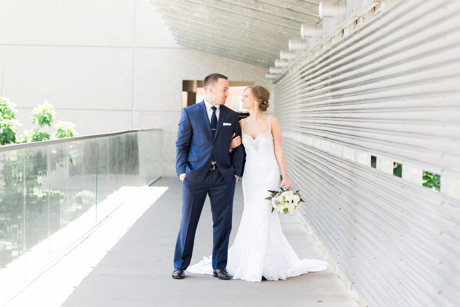 Mississippi Pearl Photography Midwest Iowa California Midwest Iowa Wedding Photographer At Hotel Vetro City Bride And Groom In Navy