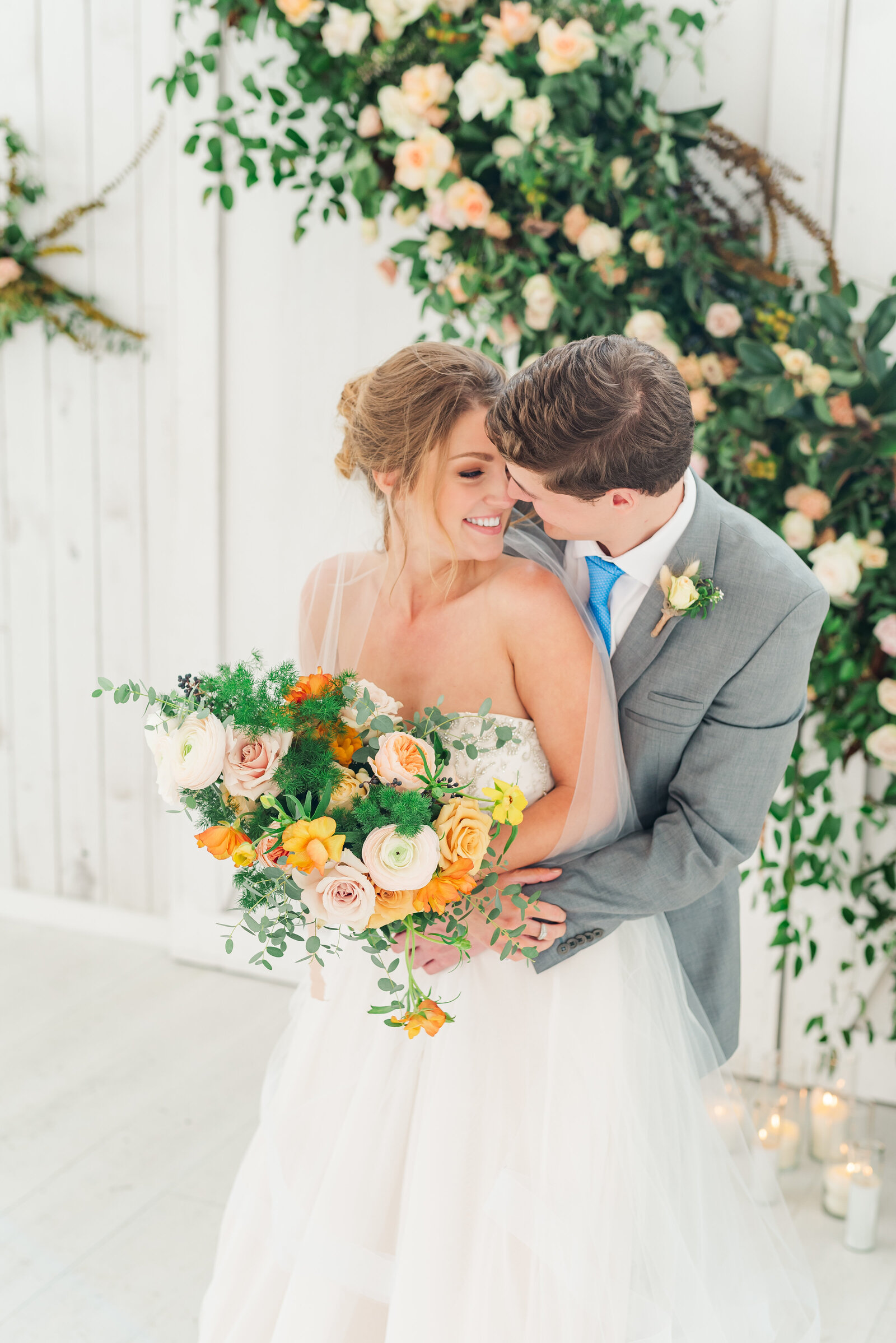 groom hugging bride at wedding venue in texas