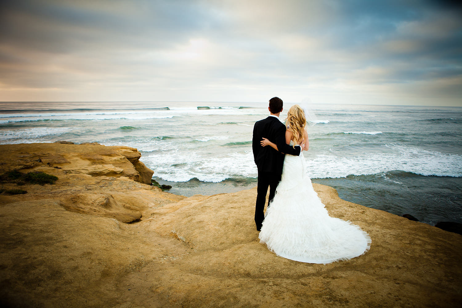 bride and groom at sunset