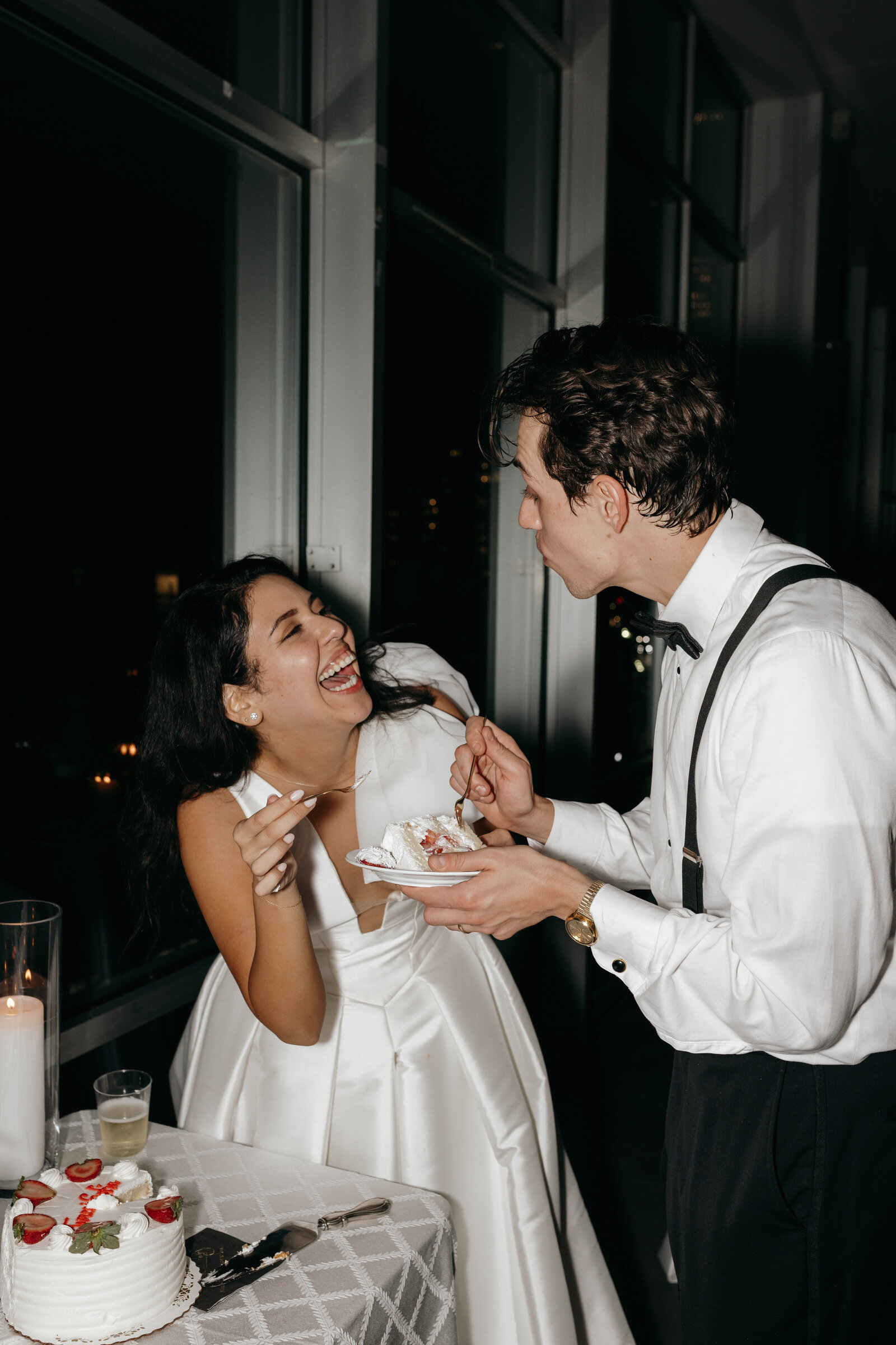 Bride and groom cutting their single tier strawberry cake in Long Island, NY | Emma LeeAnn Photography