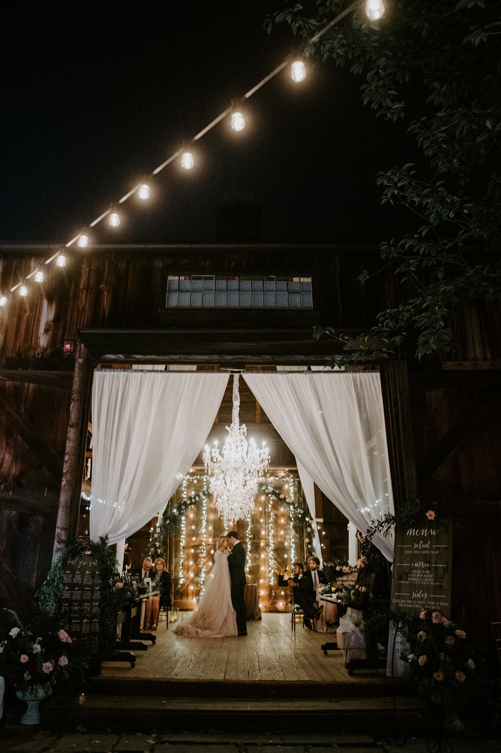 Rustic & romantic wedding at The Webb Barn with draping and chandeliers in Wethersfield, CT