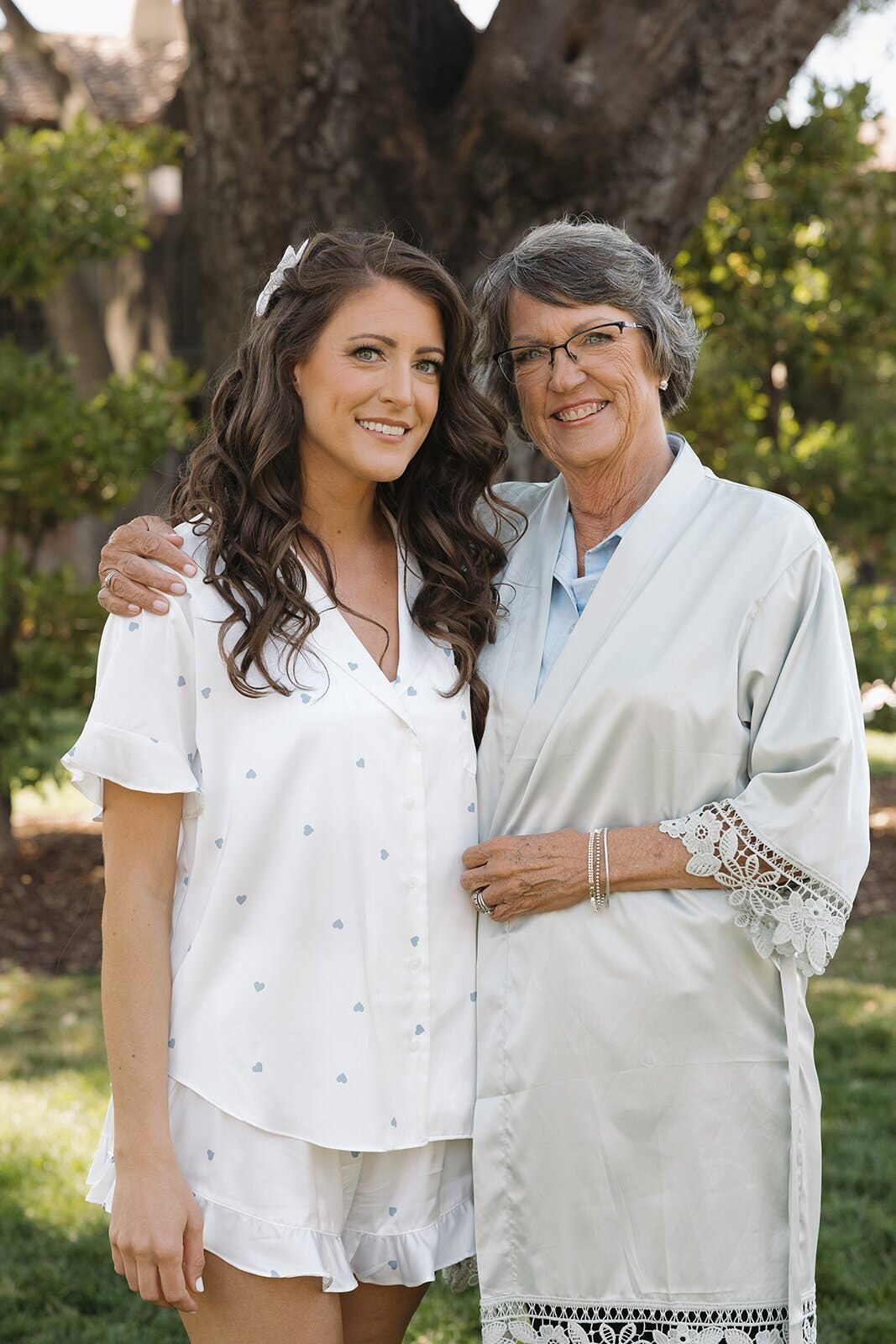 Bride with her mom while getting ready
