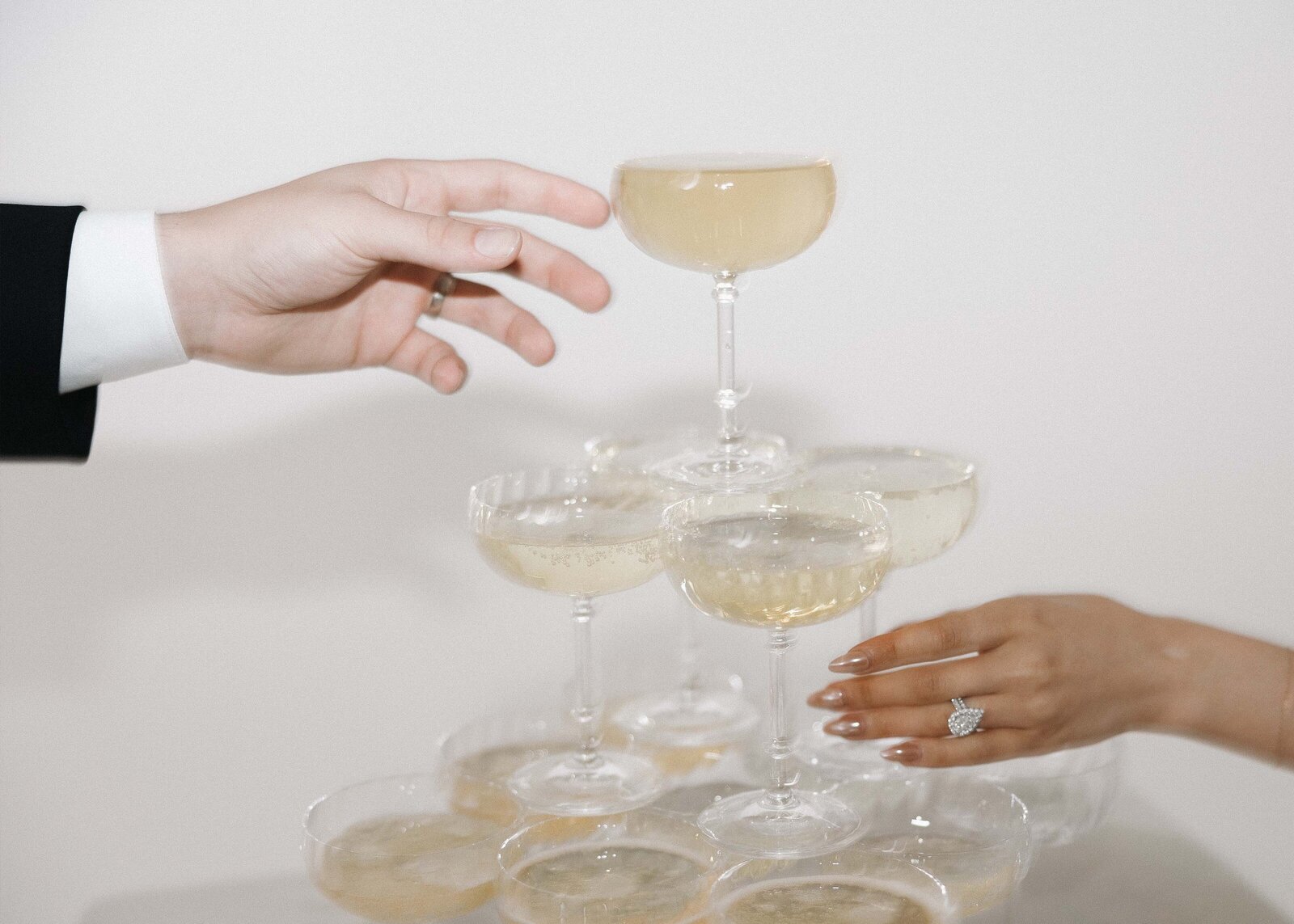 grace-trexel-photo-cinematic-wedding-couple-champagne-tower