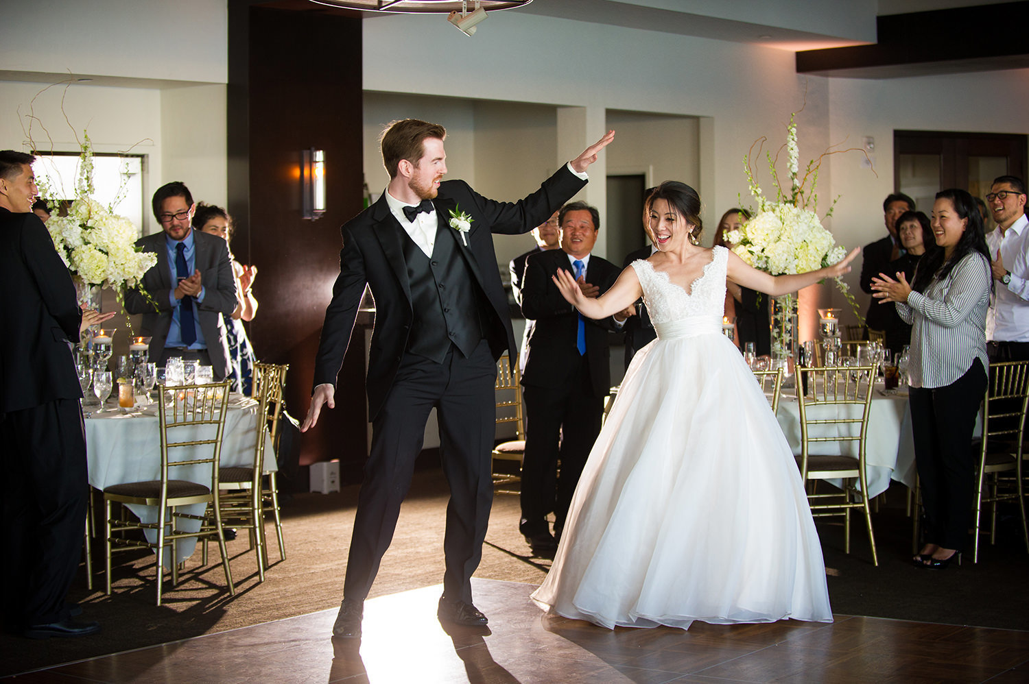 bride and groom dancing a fun first dance