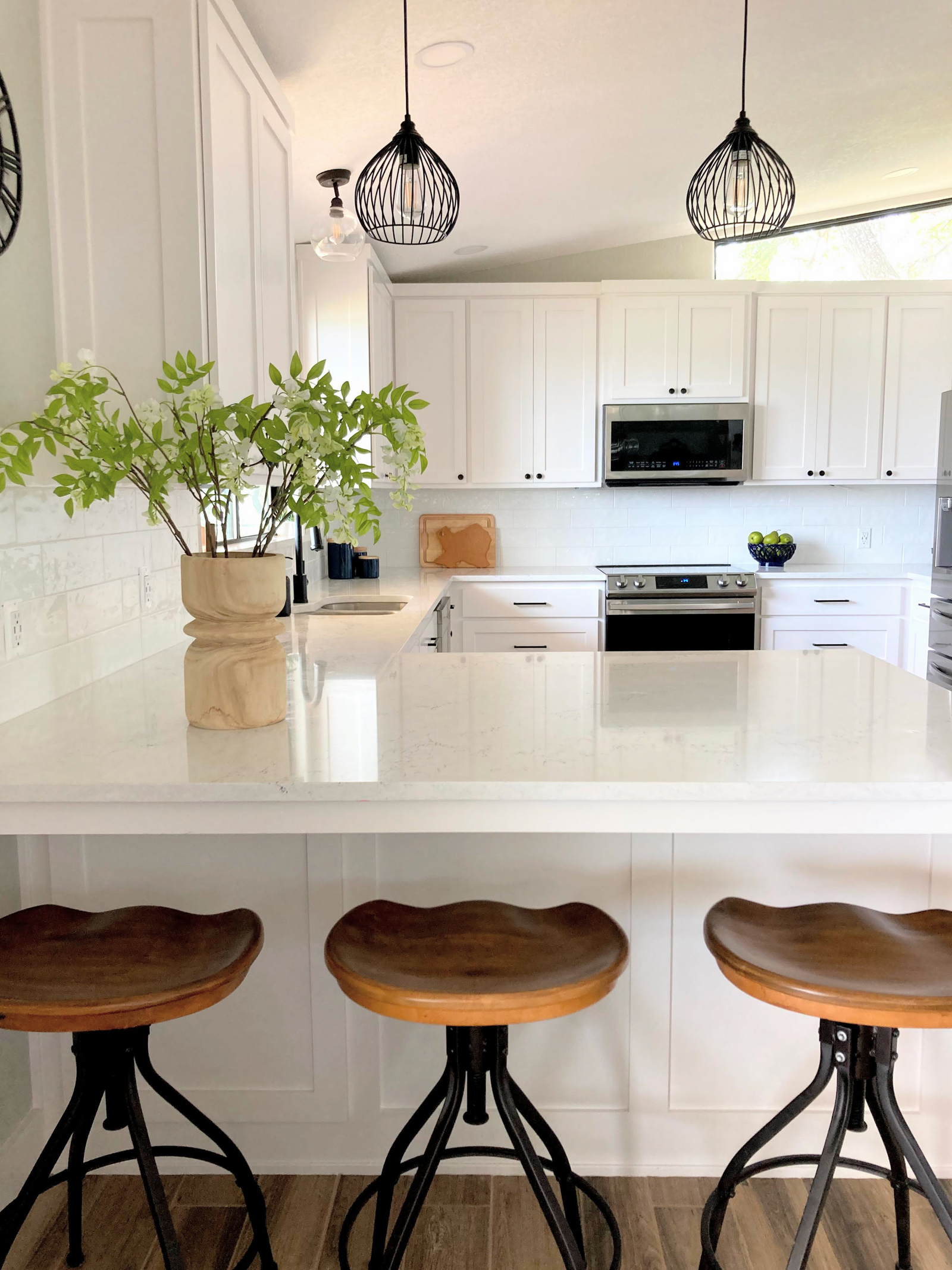 dusti j design white kitchen camel stools