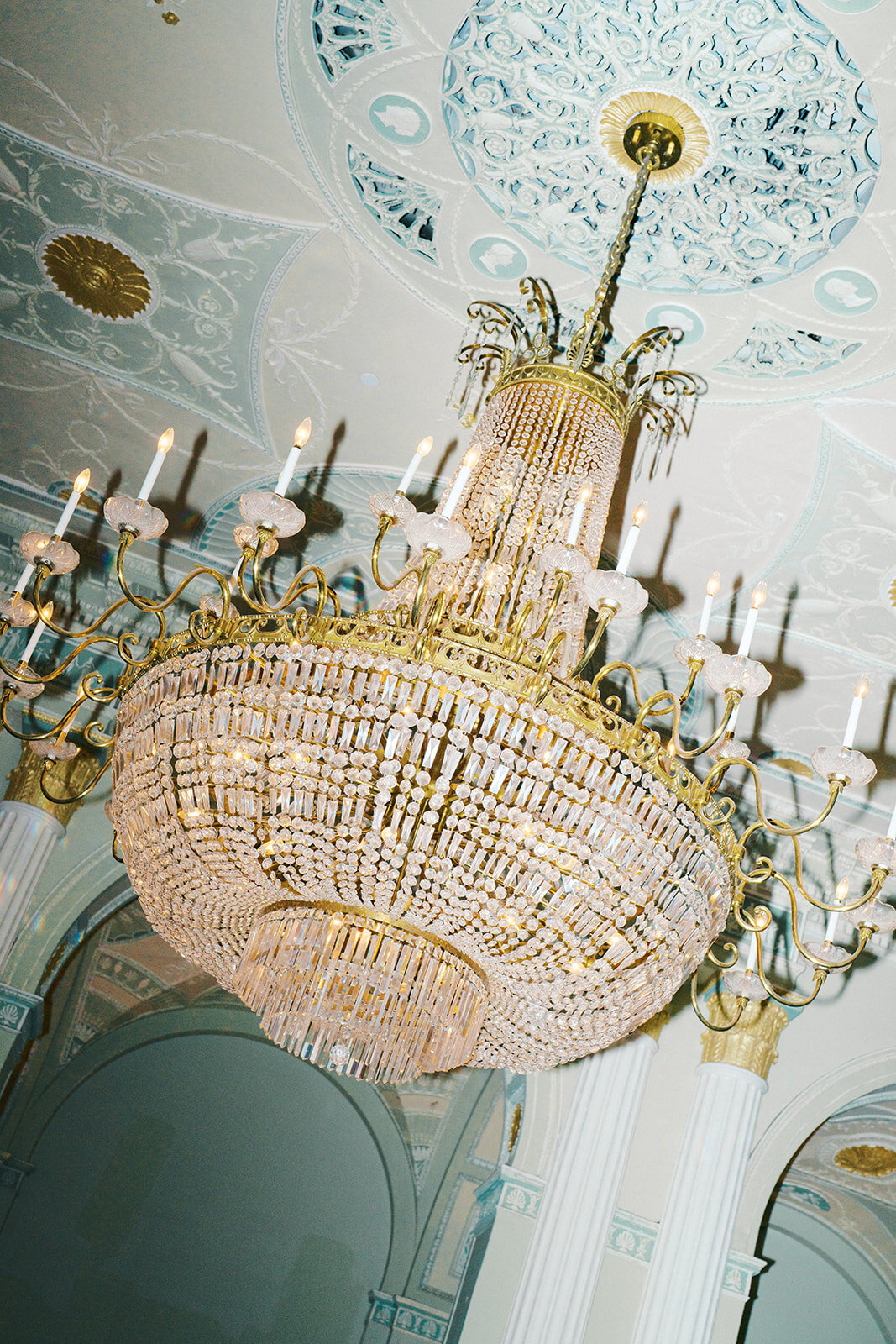 Chandelier glows during reception at Biltmore Ballrooms