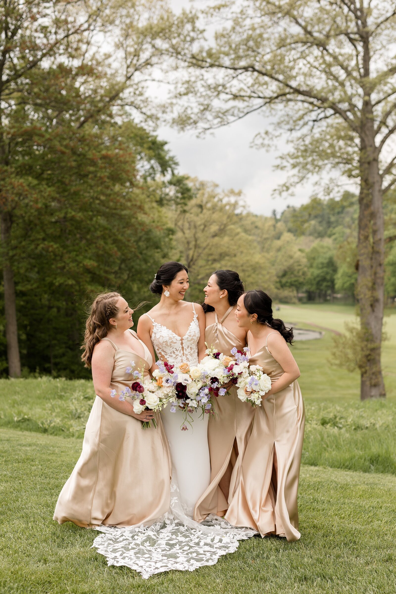 Bride-and-her-bridesmaids-overlooking-the-golf-course-at-london-hunt-club