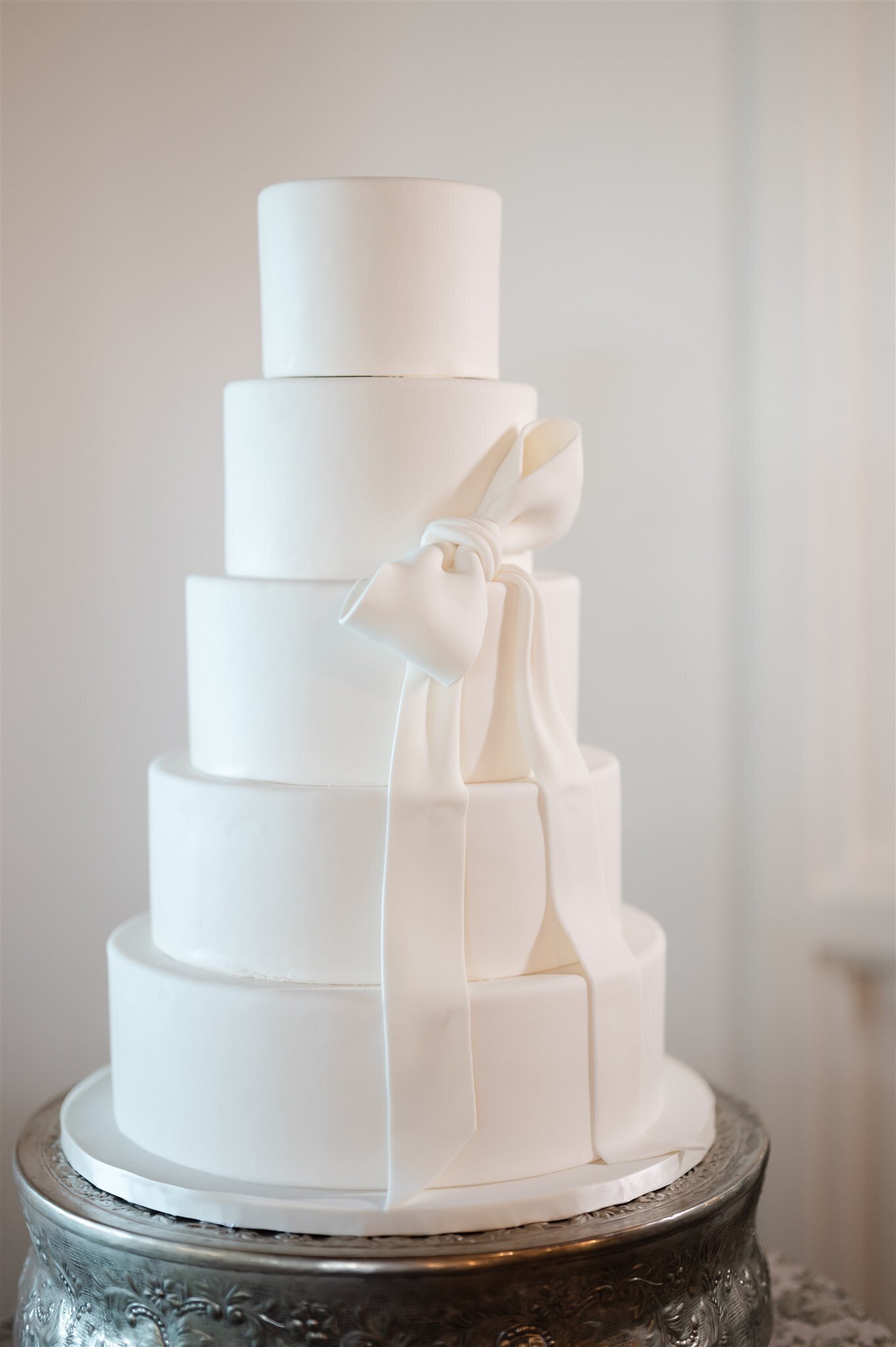 wedding cake with a fondant bow
