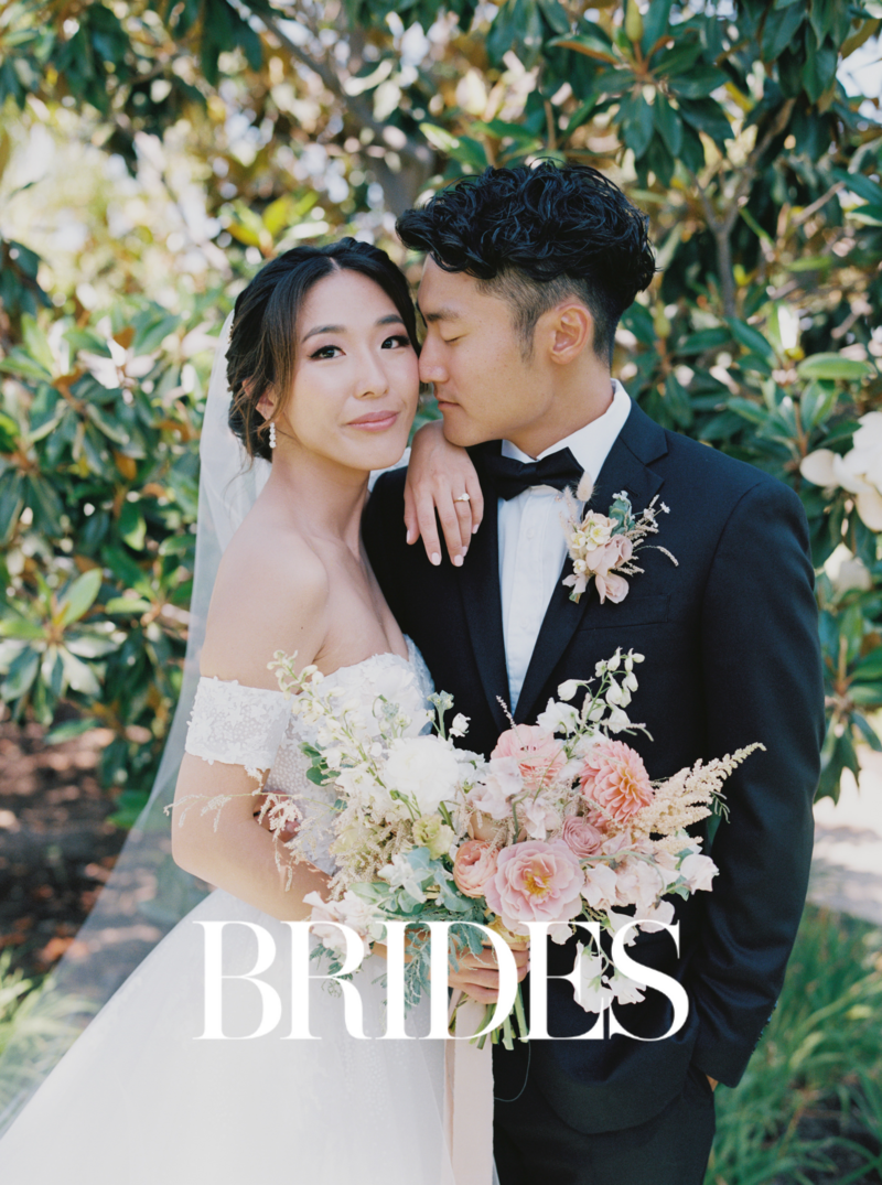 Kohnur bride with soft glam makeup, rosy cheeks, and nude lipstick in romantic outdoor garden wedding editorial featured on Brides.com