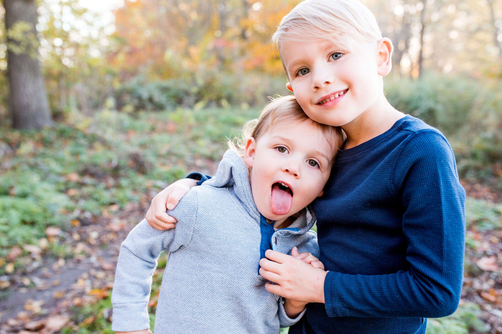 Brothers goof around during fall family session