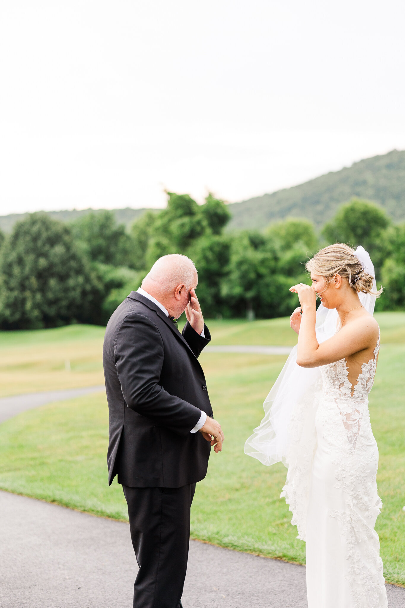 Emotional moment as bride and father tear up and hug during first look at SkyView Golf Club