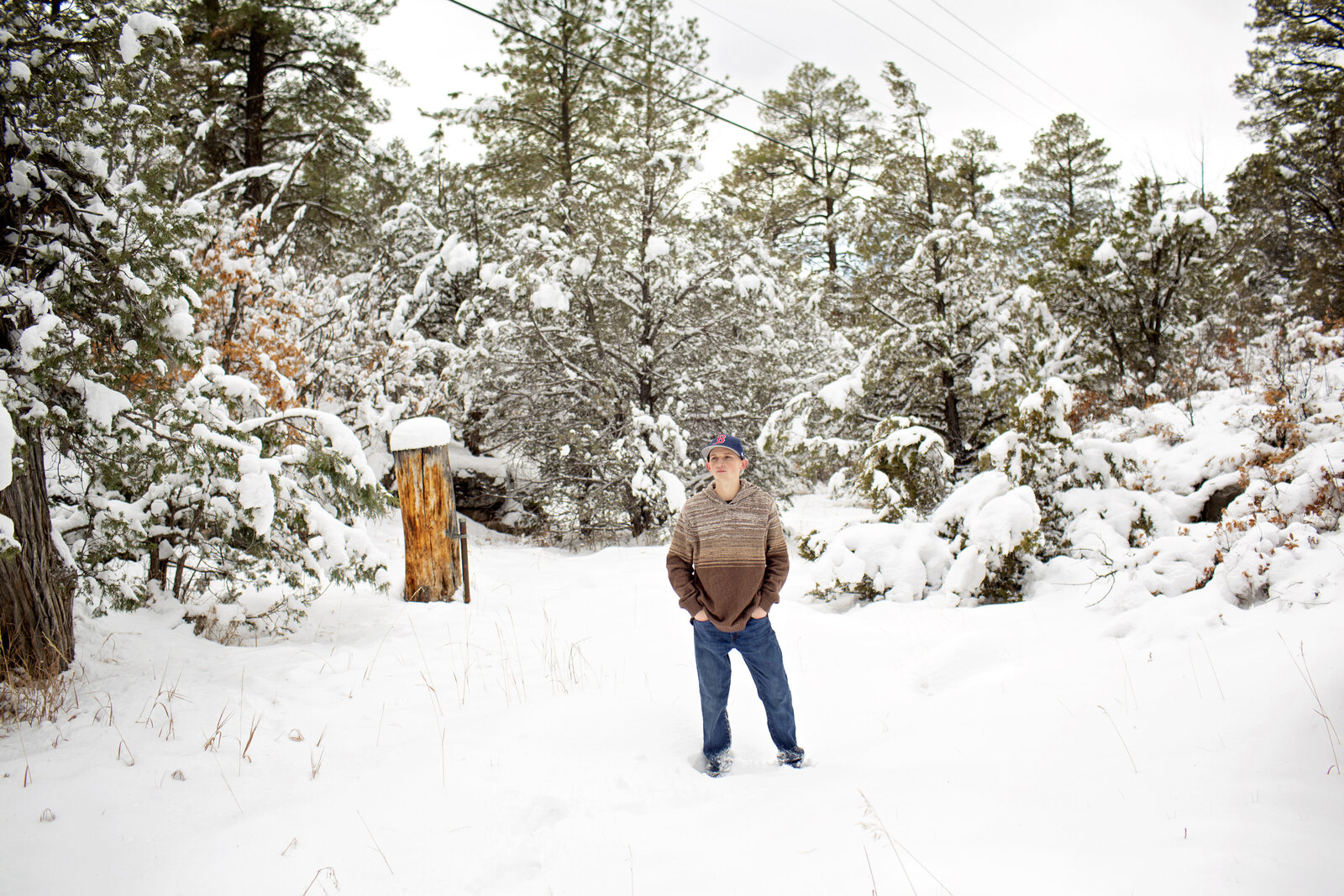 Snowy-Boy-Senior-Session-in-the-mountains-NM