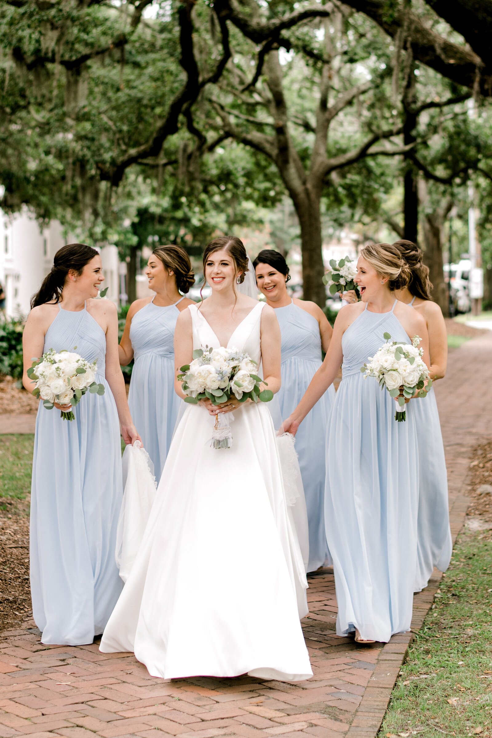 Bridesmaids ice blue dresses