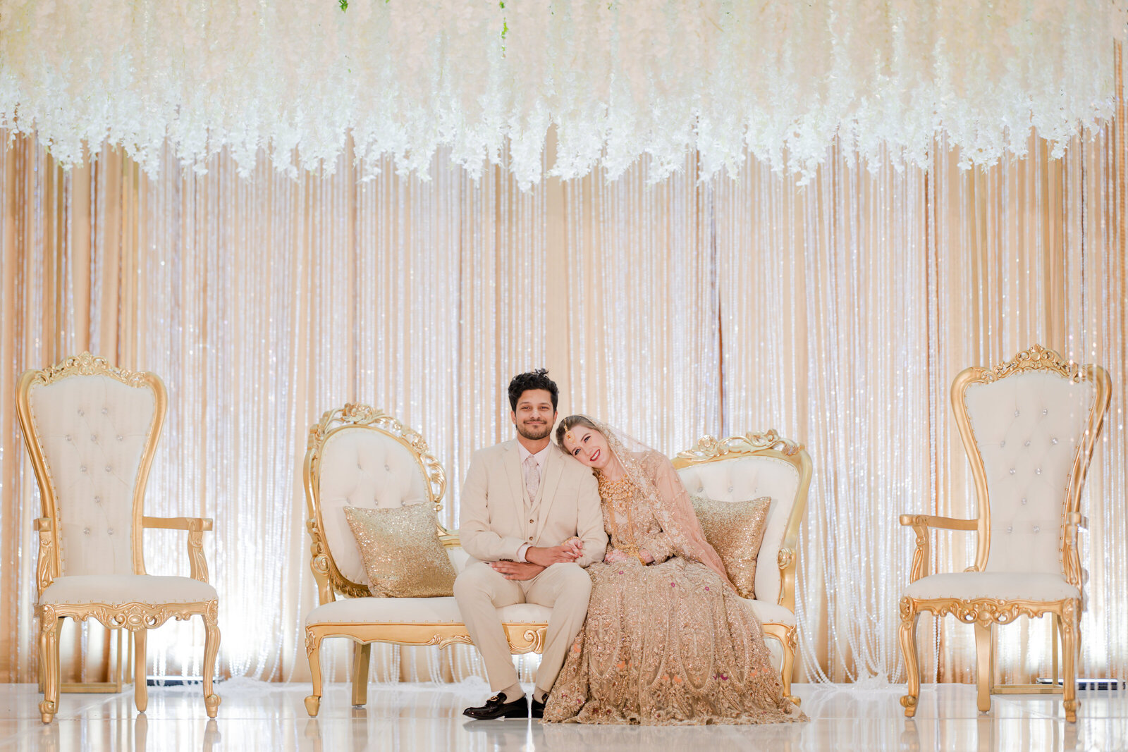 Desi-bride-and-groom-on-stage-photography
