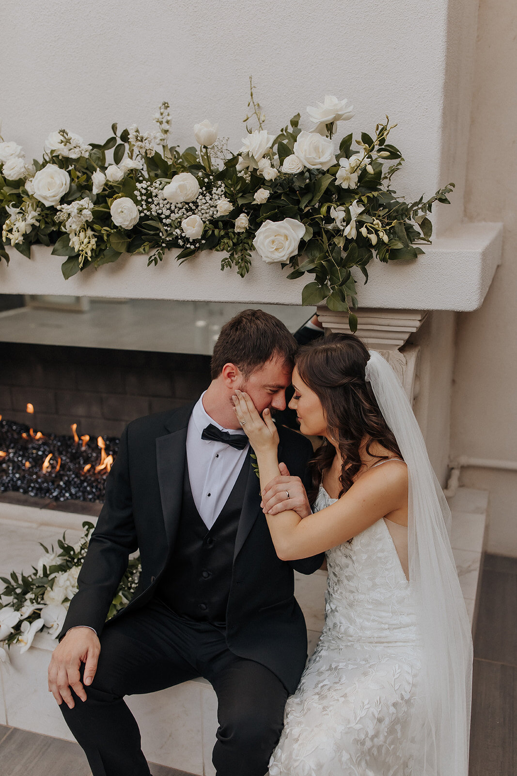 soho63-chandler-wedding-venue-bridee-and-groom-fireplace-and-flowers